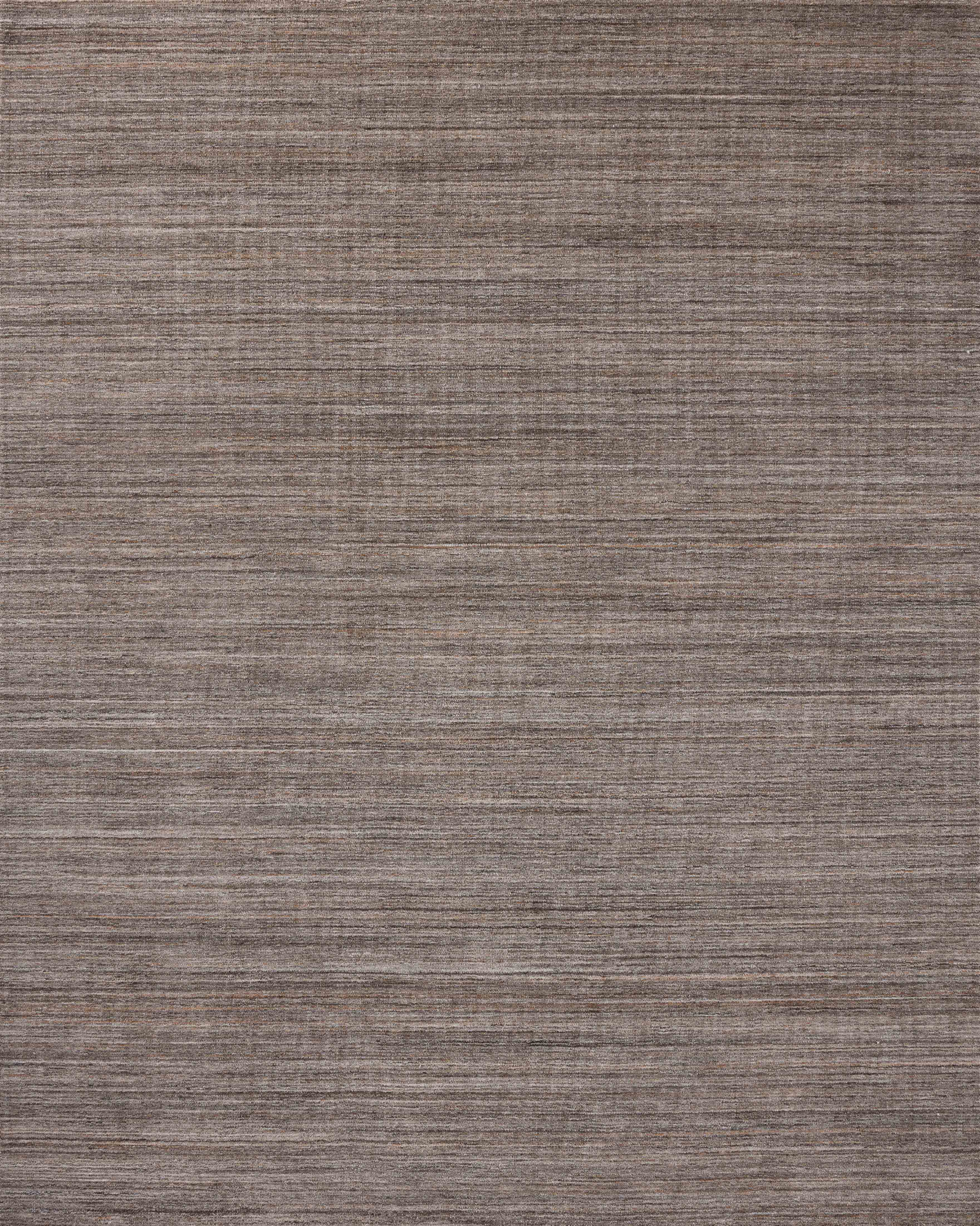 A hand-loomed polyester area rug with grounding stone tones, the Thorne THT-01 Stone Area Rug adds character to any room