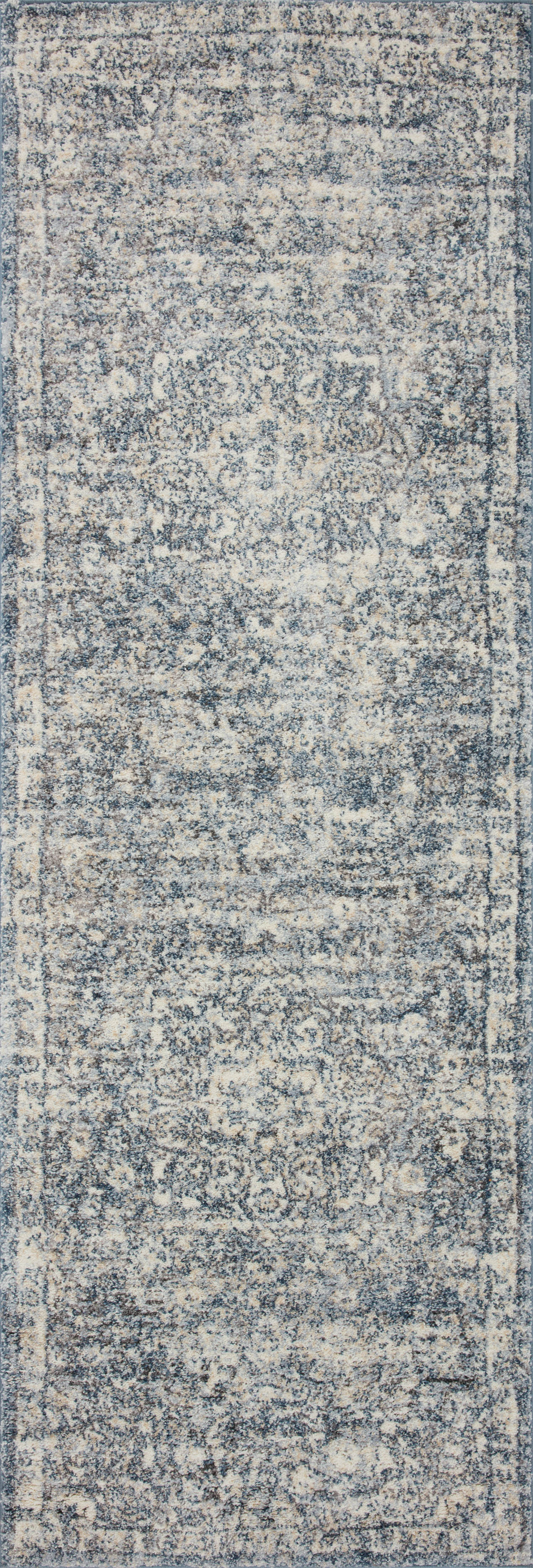 With refined ivory and calming blue hues and transitional styling, the Theory THY-02 Ivory / Blue Area Rug is a power-loomed polypropylene and polyester area rug that elevates any room