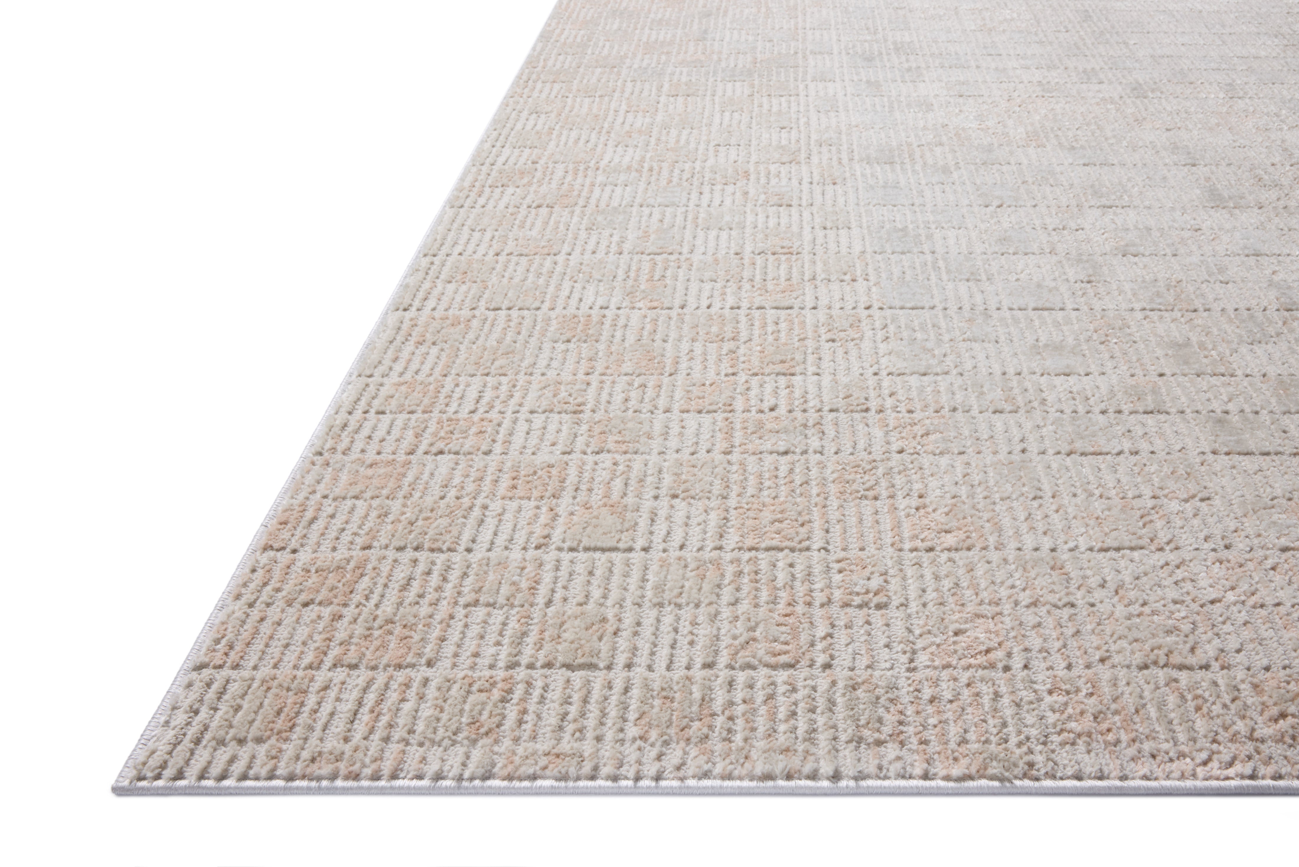 Rich in warm beige and earthy clay hues with abstract detail, the Townes TOW-06 Beige / Clay Area Rug is a power-loomed polyester area rug built for style and comfort