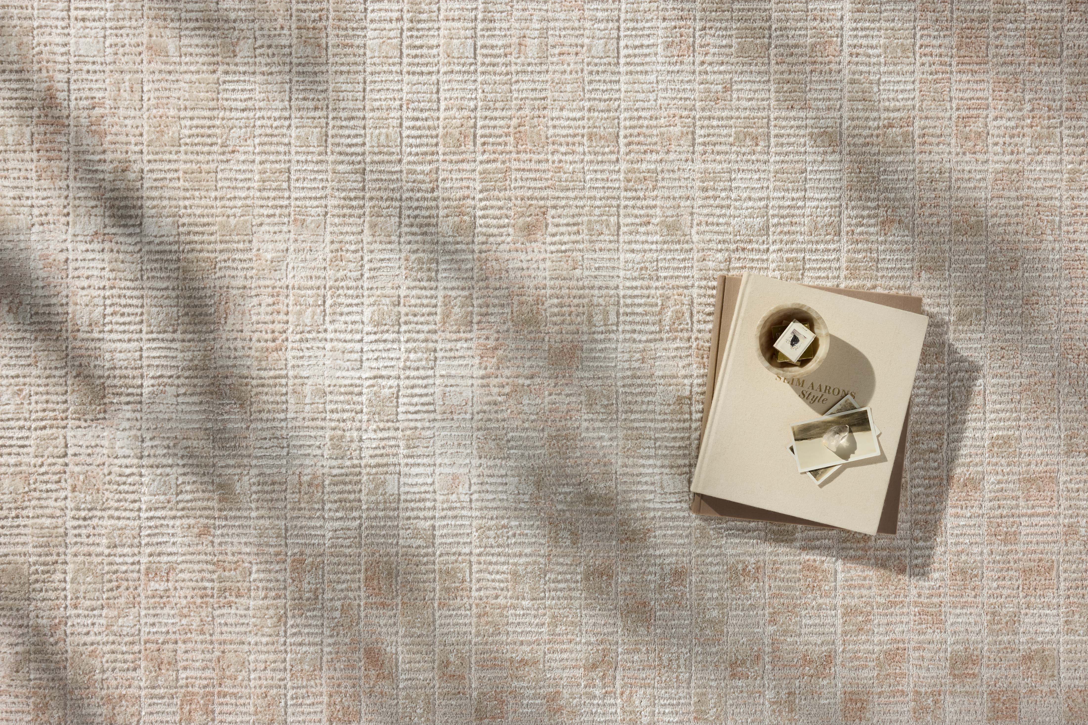 Rich in warm beige and earthy clay hues with abstract detail, the Townes TOW-06 Beige / Clay Area Rug is a power-loomed polyester area rug built for style and comfort