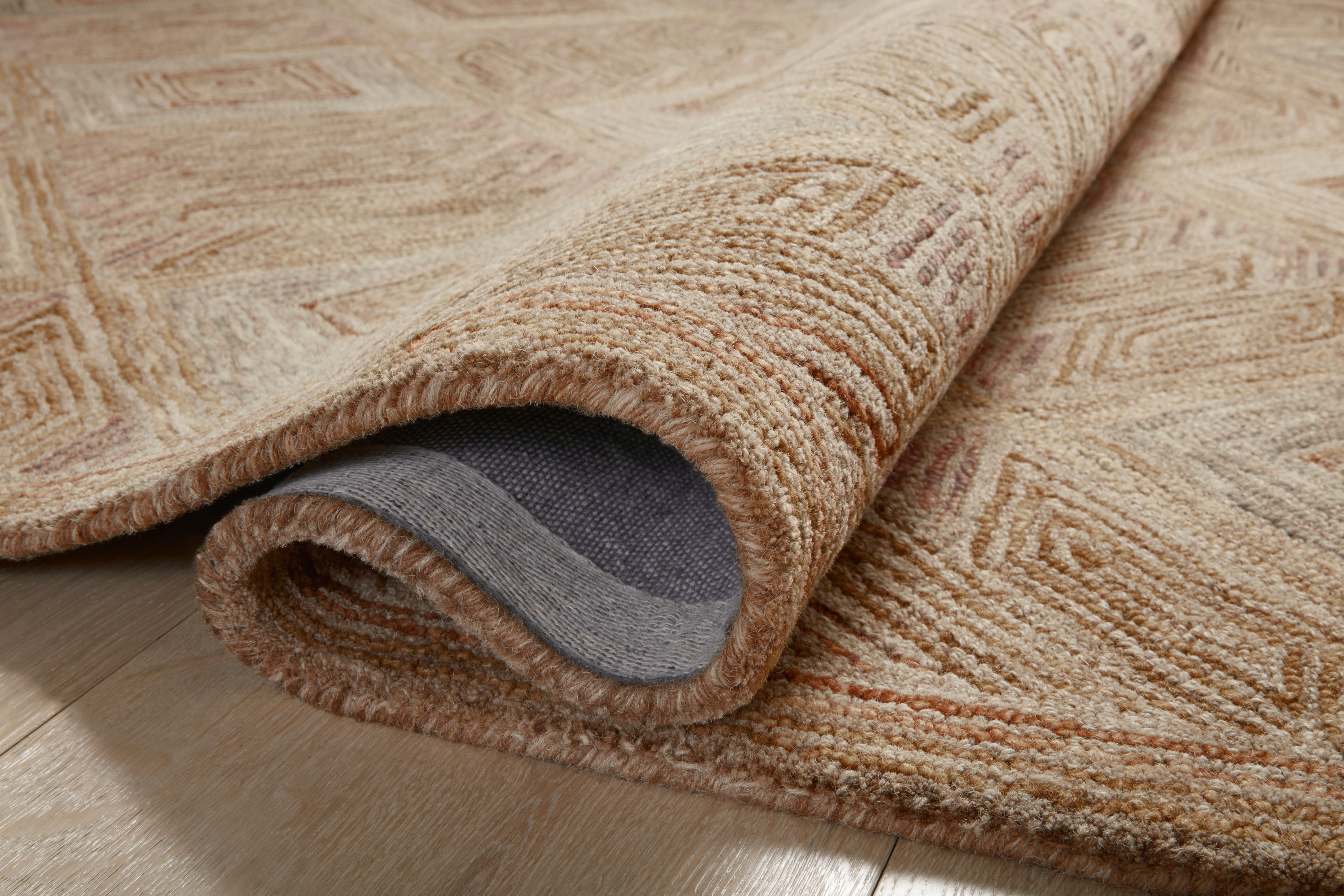 The Varena VAR-02 Berry / Multi Area Rug brings vibrant berry and vibrant multi-toned character and graphic flair to your home in a hand-tufted 100% wool area rug