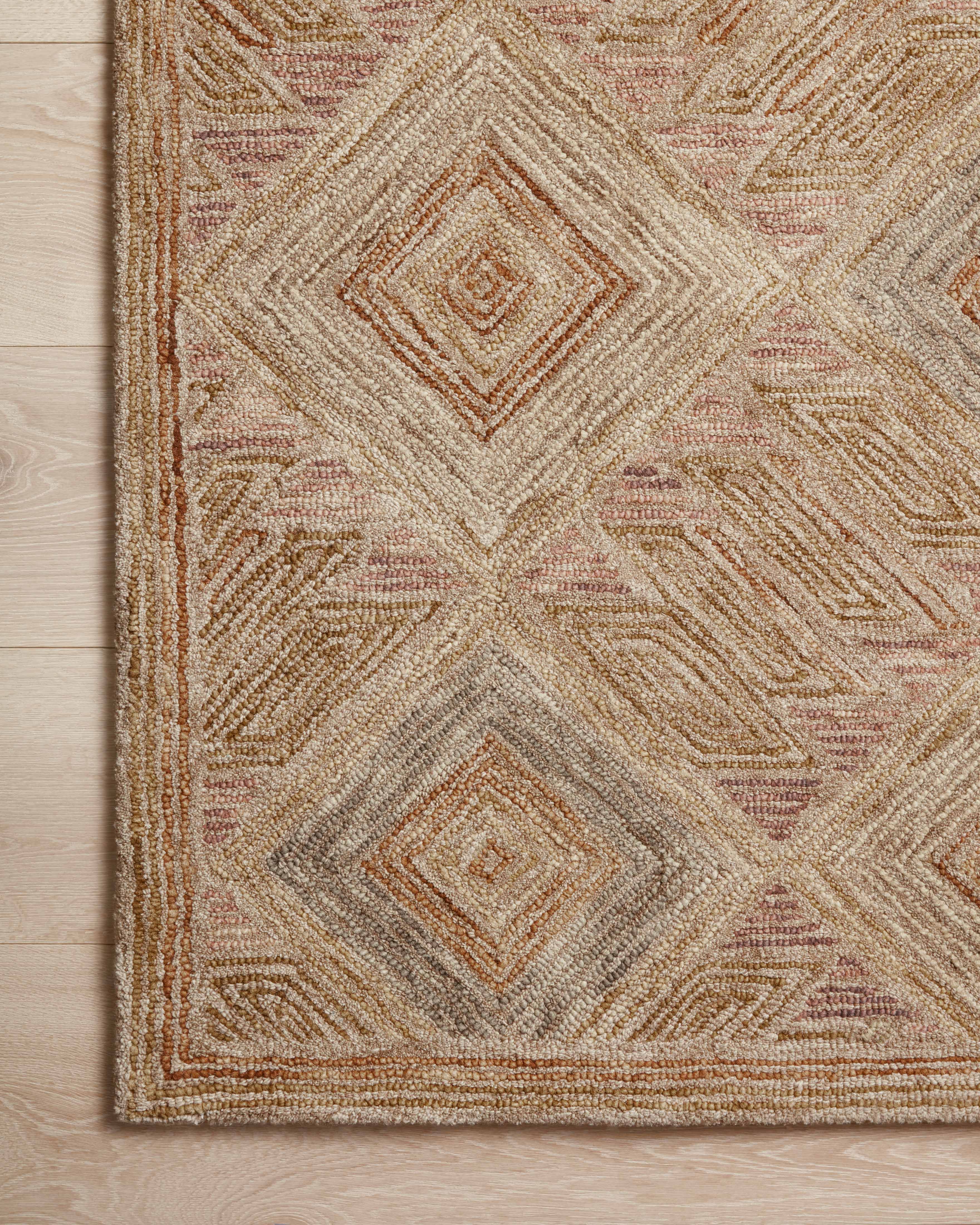The Varena VAR-02 Berry / Multi Area Rug brings vibrant berry and vibrant multi-toned character and graphic flair to your home in a hand-tufted 100% wool area rug