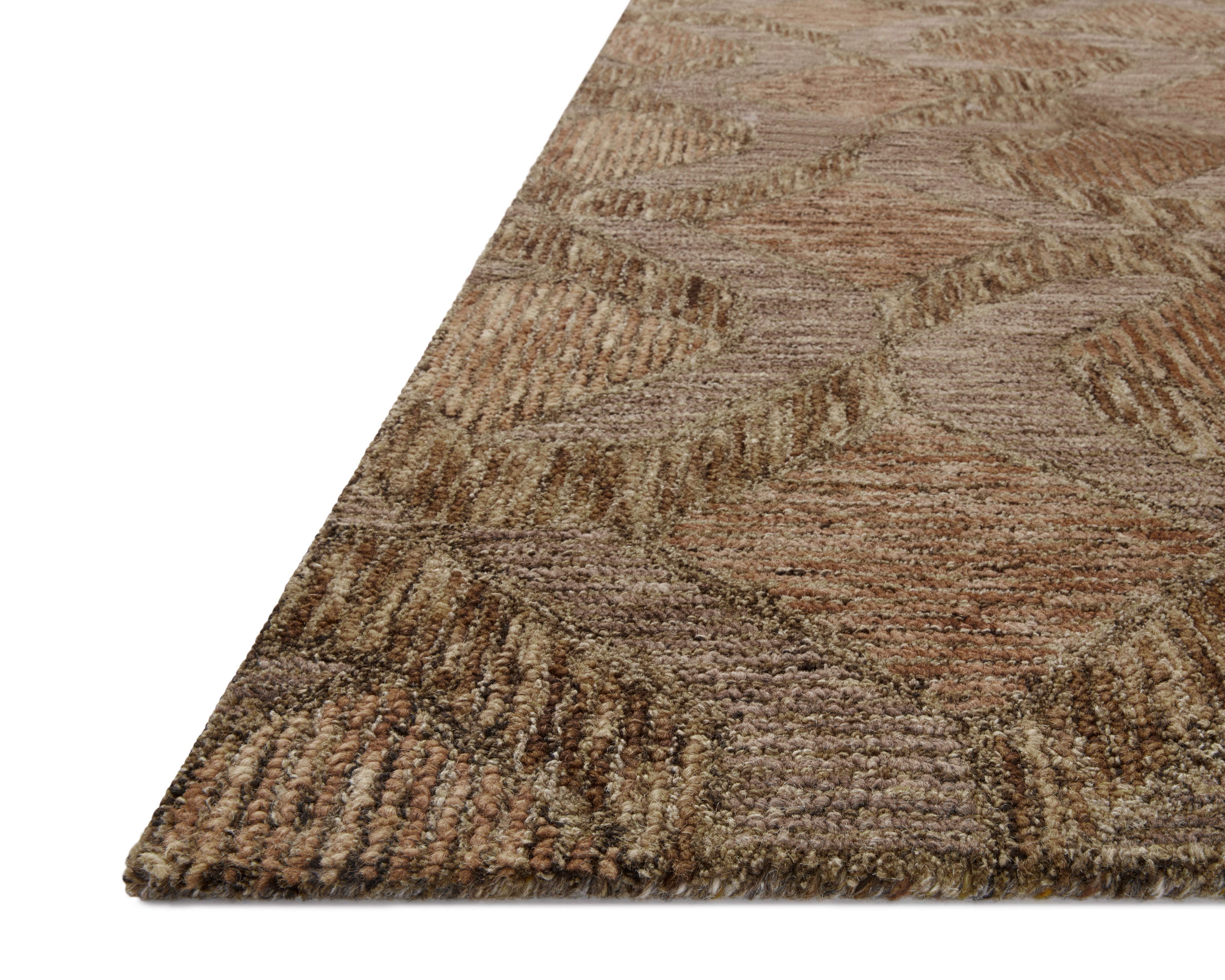 Finished in warm rust and grounded bark tones with graphic styling, the Varena VAR-03 Rust / Bark Area Rug is a hand-tufted 100% wool area rug for modern living