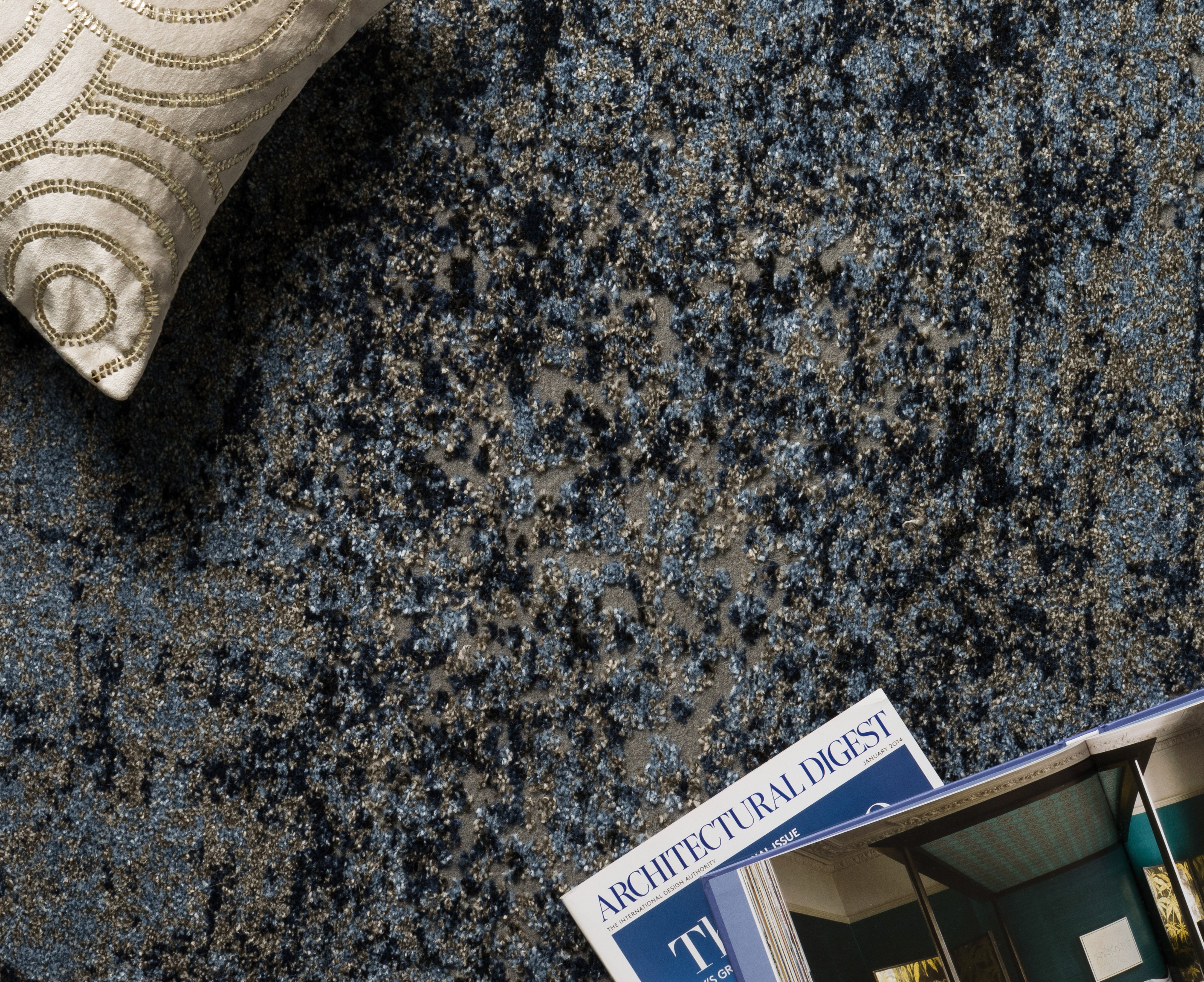 A power-loomed polypropylene and polyester area rug in elegant grey and classic navy tones with contemporary and vintage motifs, the Viera VR-07 Grey / Navy Area Rug grounds your room beautifully
