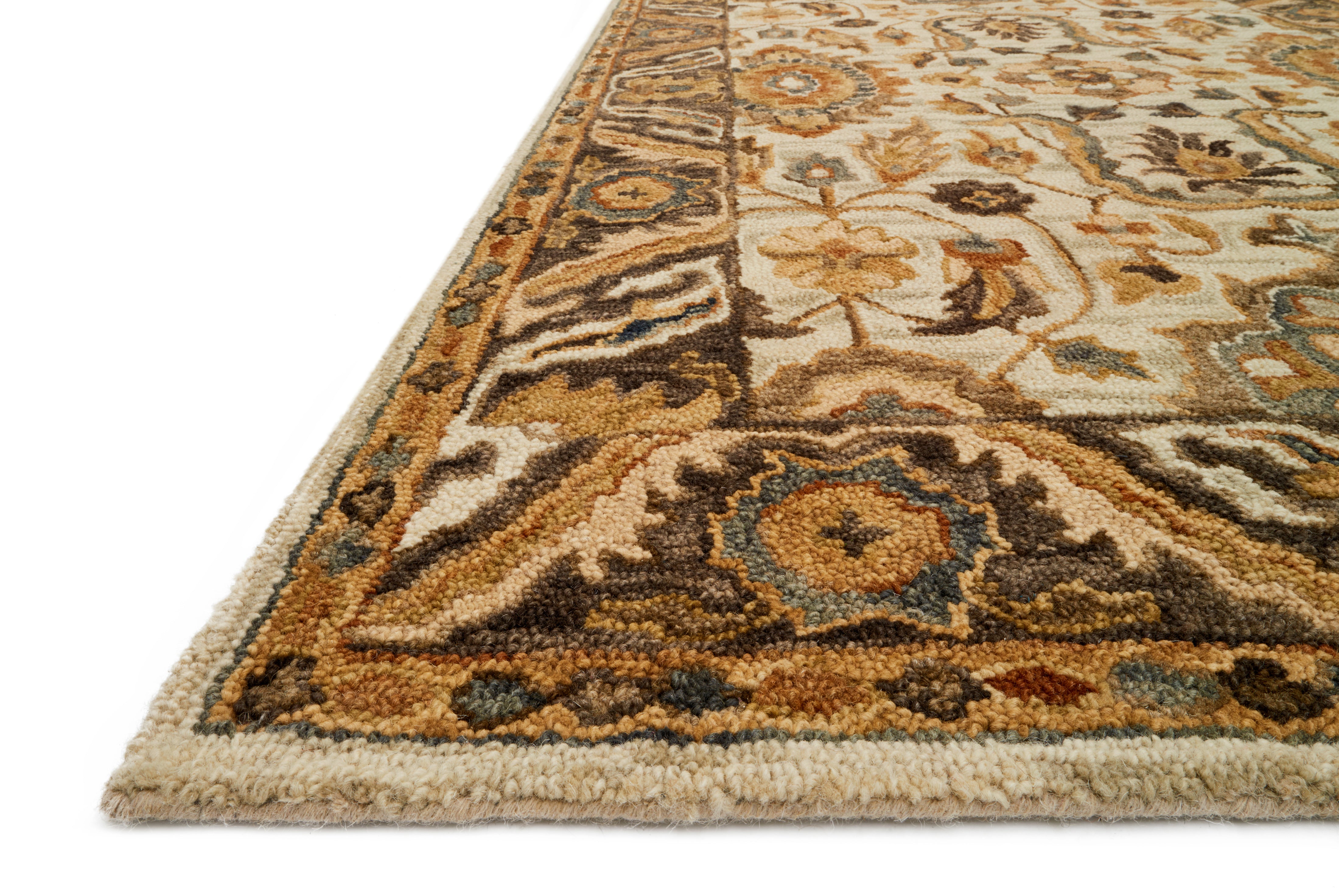 The Victoria VK-02 Ivory / Dk Taupe Area Rug pairs refined ivory and dk taupe tones and traditional patterns in a hooked 100% wool area rug