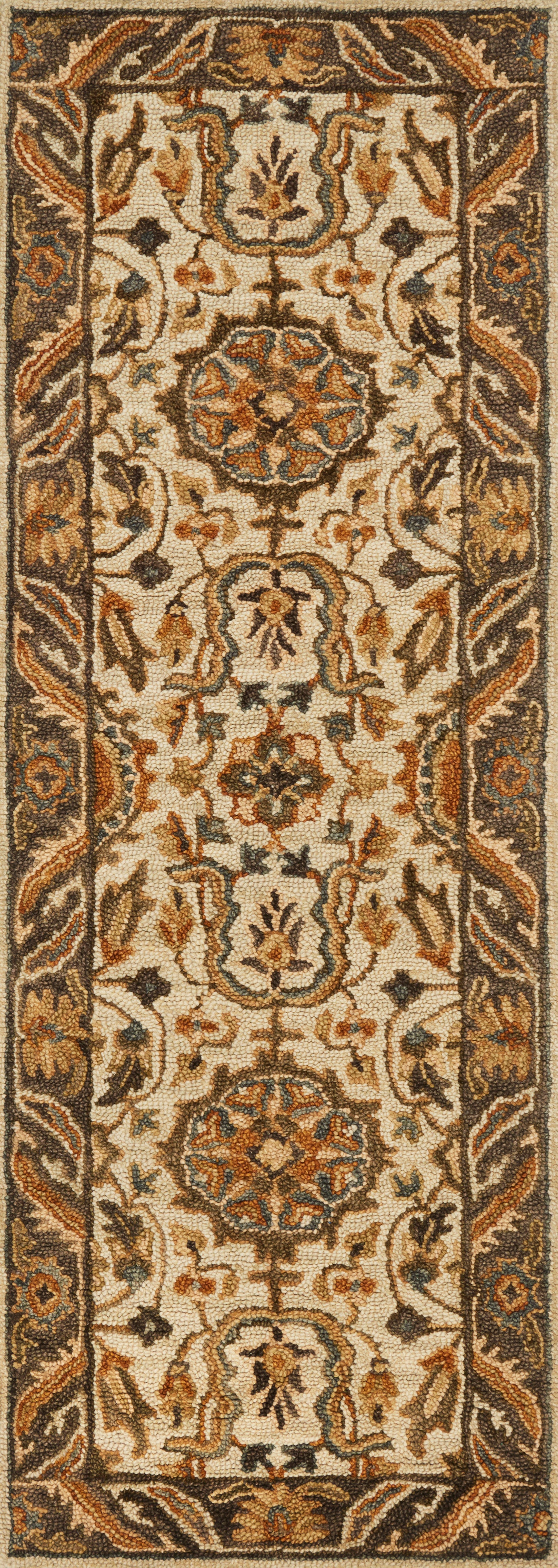 The Victoria VK-02 Ivory / Dk Taupe Area Rug pairs refined ivory and dk taupe tones and traditional patterns in a hooked 100% wool area rug