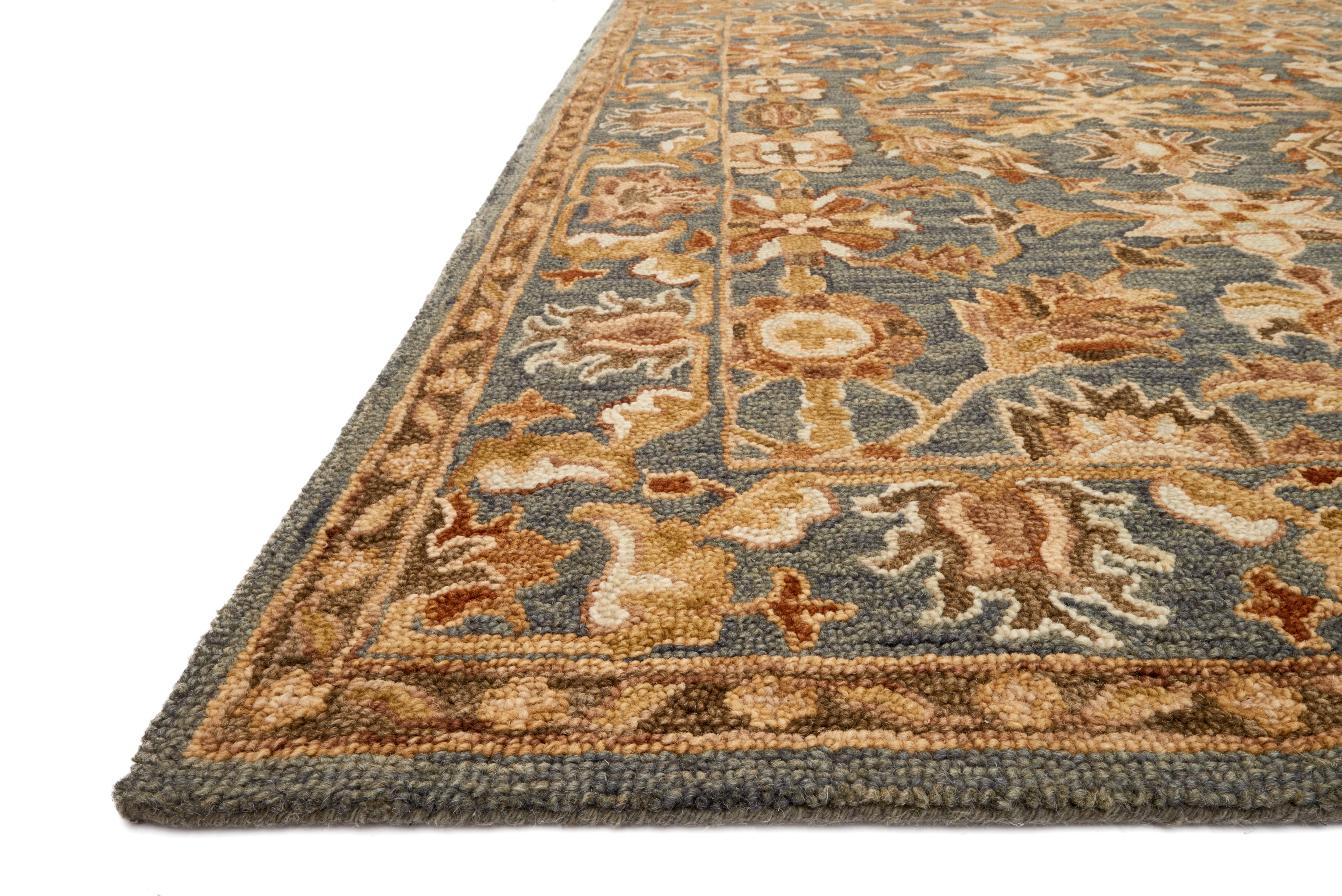With cool slate and cool slate hues and traditional styling, the Victoria VK-05 Slate / Slate Area Rug is a hooked 100% wool area rug that elevates any room