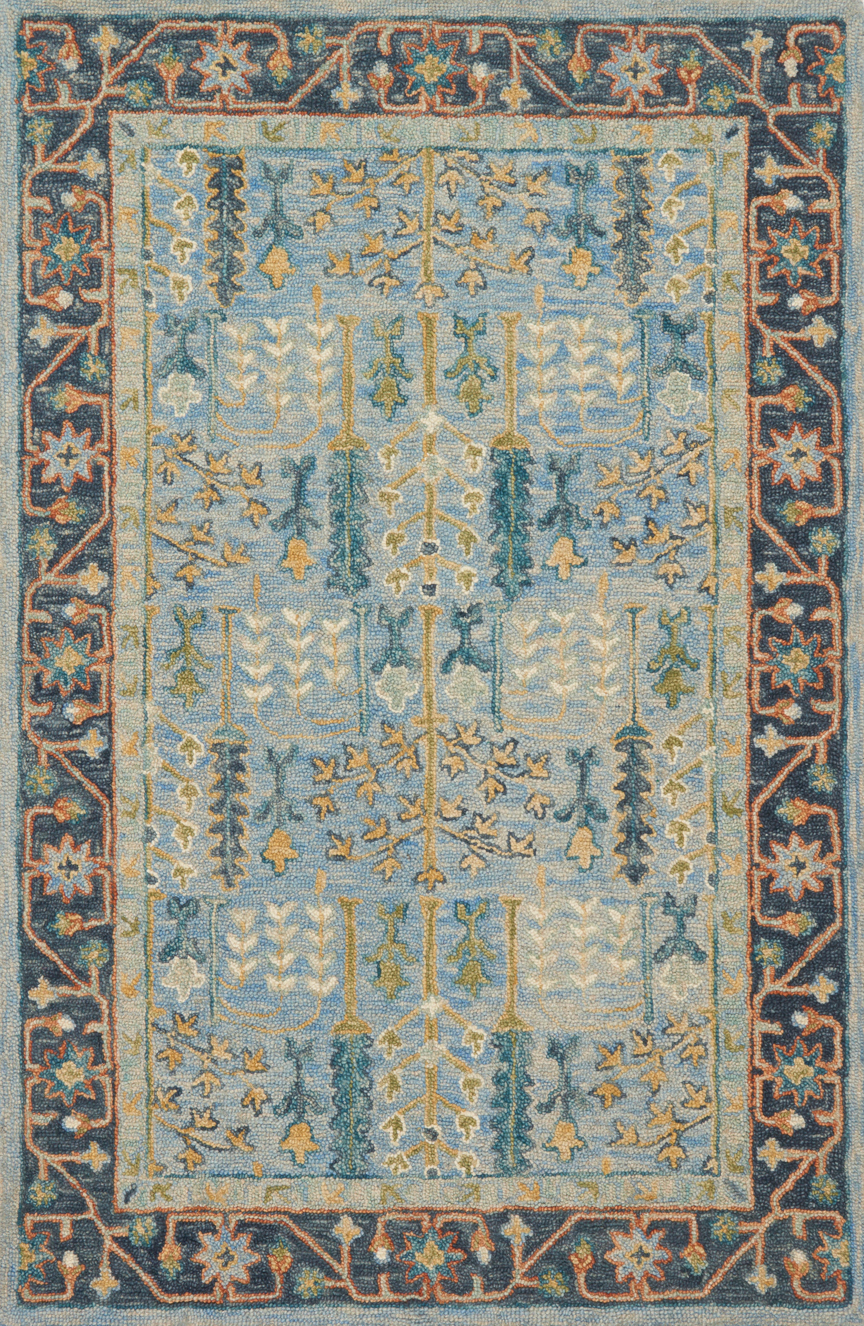 A hooked 100% wool area rug featuring traditional design and lt blue and dk blue tones, the Victoria VK-12 Lt Blue / Dk Blue Area Rug adds character to any room
