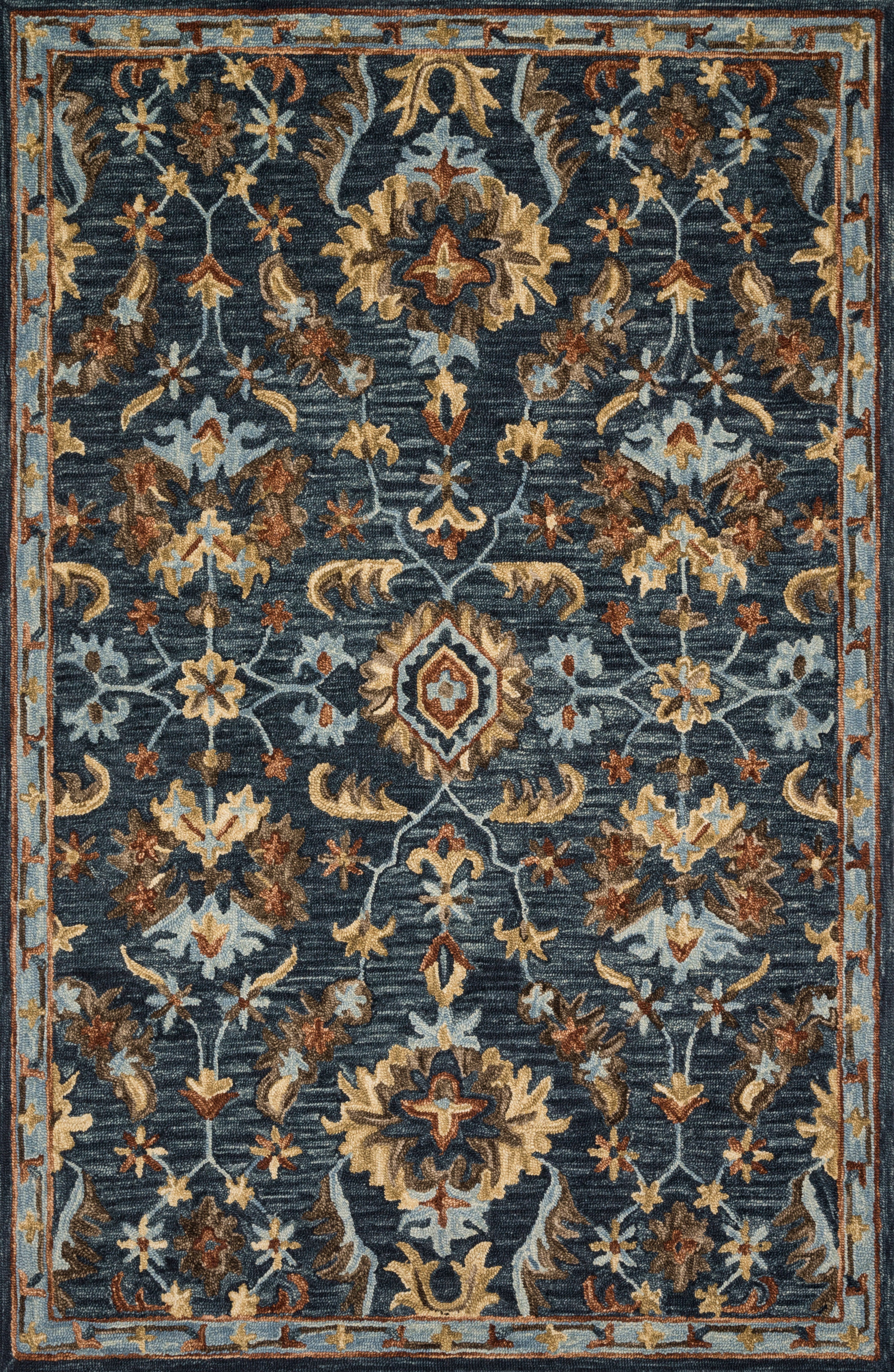 The Victoria VK-14 Denim / Multi Area Rug offers casual denim and vibrant multi-toned sophistication and traditional charm in a hooked 100% wool area rug