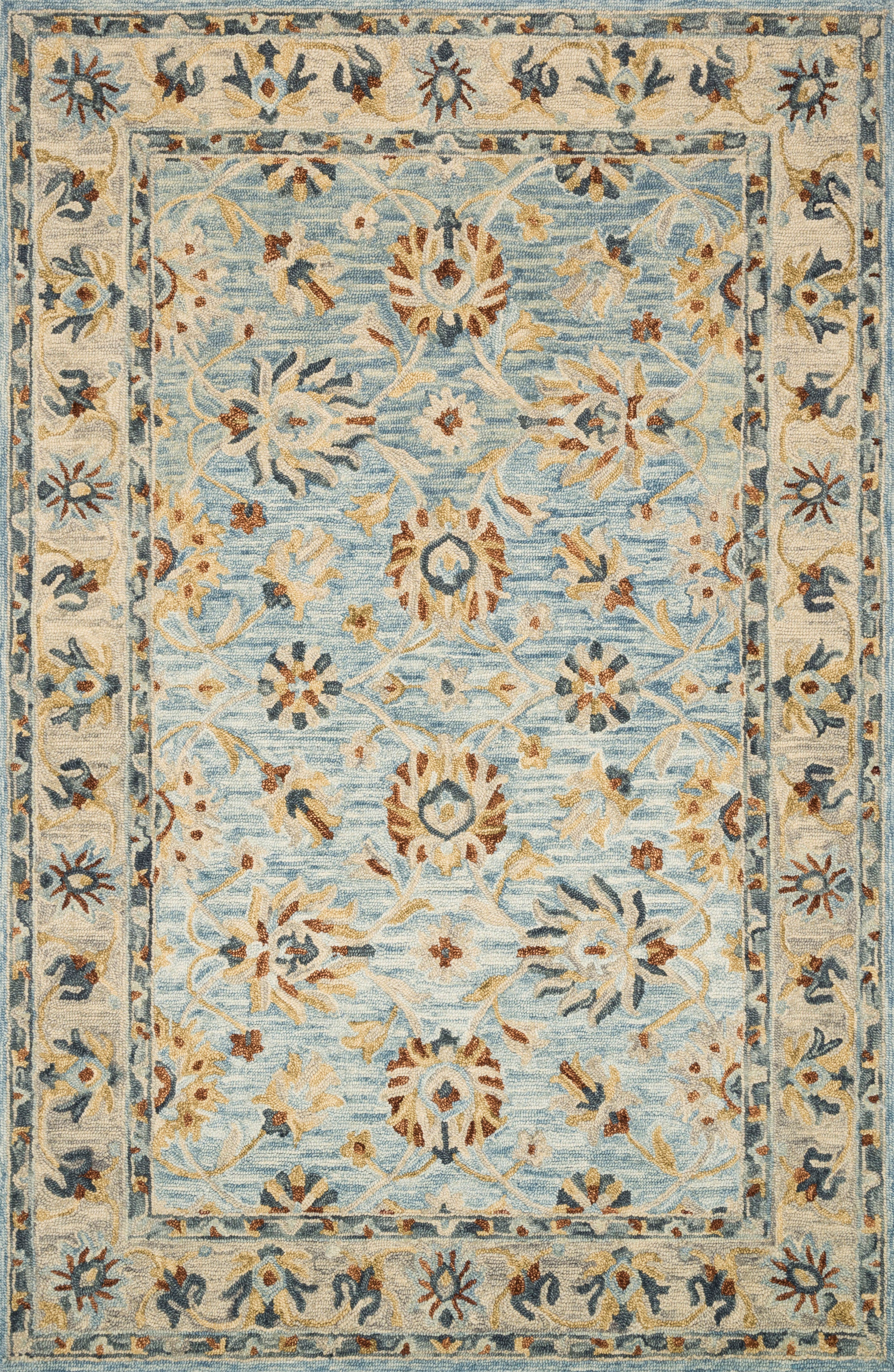 The Victoria VK-18 Lt. Blue / Natural Area Rug highlights light blue and warm natural tones and traditional texture in a beautifully made hooked 100% wool area rug