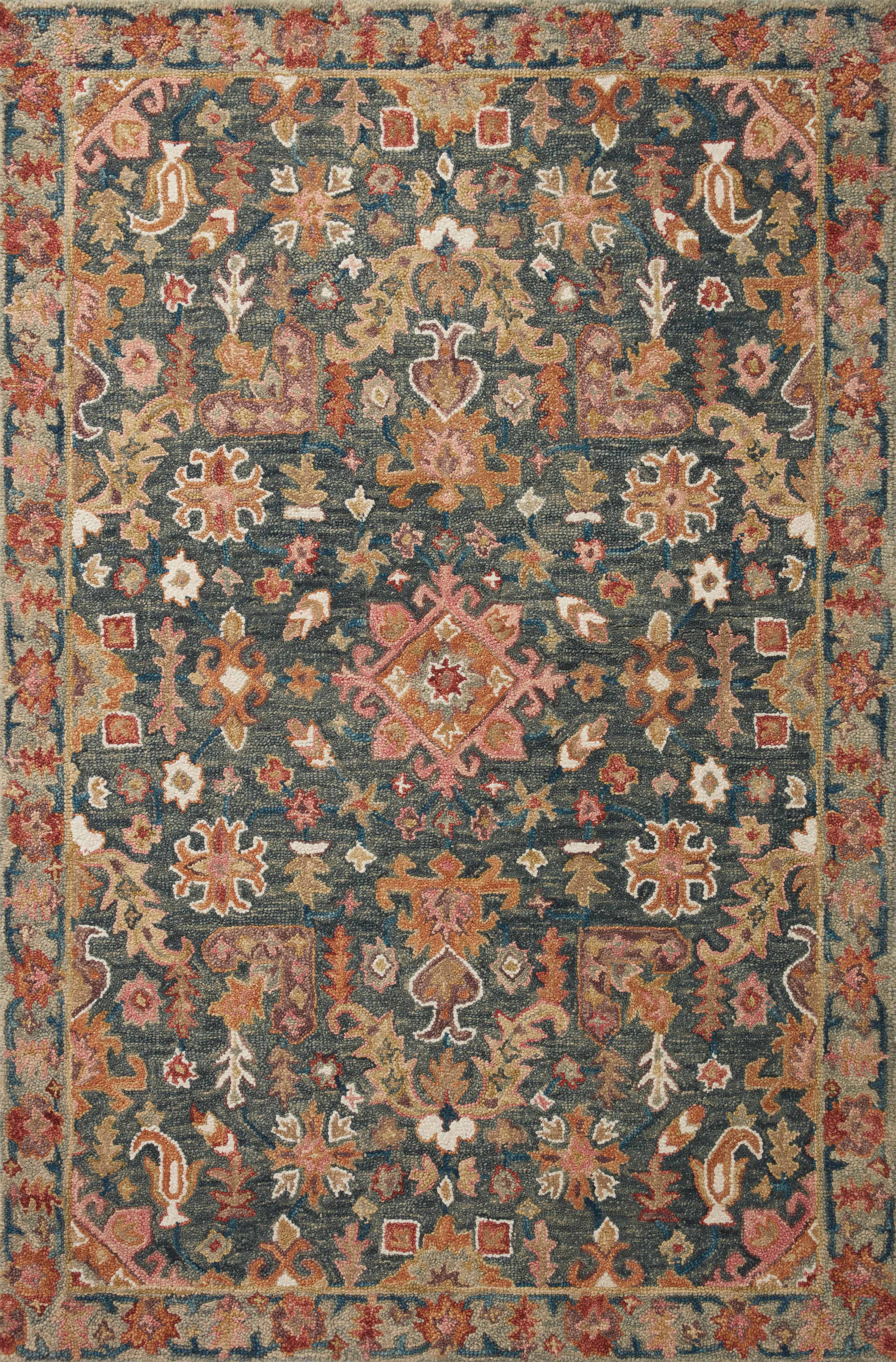 The Victoria VK-22 Navy / Multi Area Rug is a hooked 100% wool area rug that radiates classic navy and vibrant multi-toned charm and traditional elegance