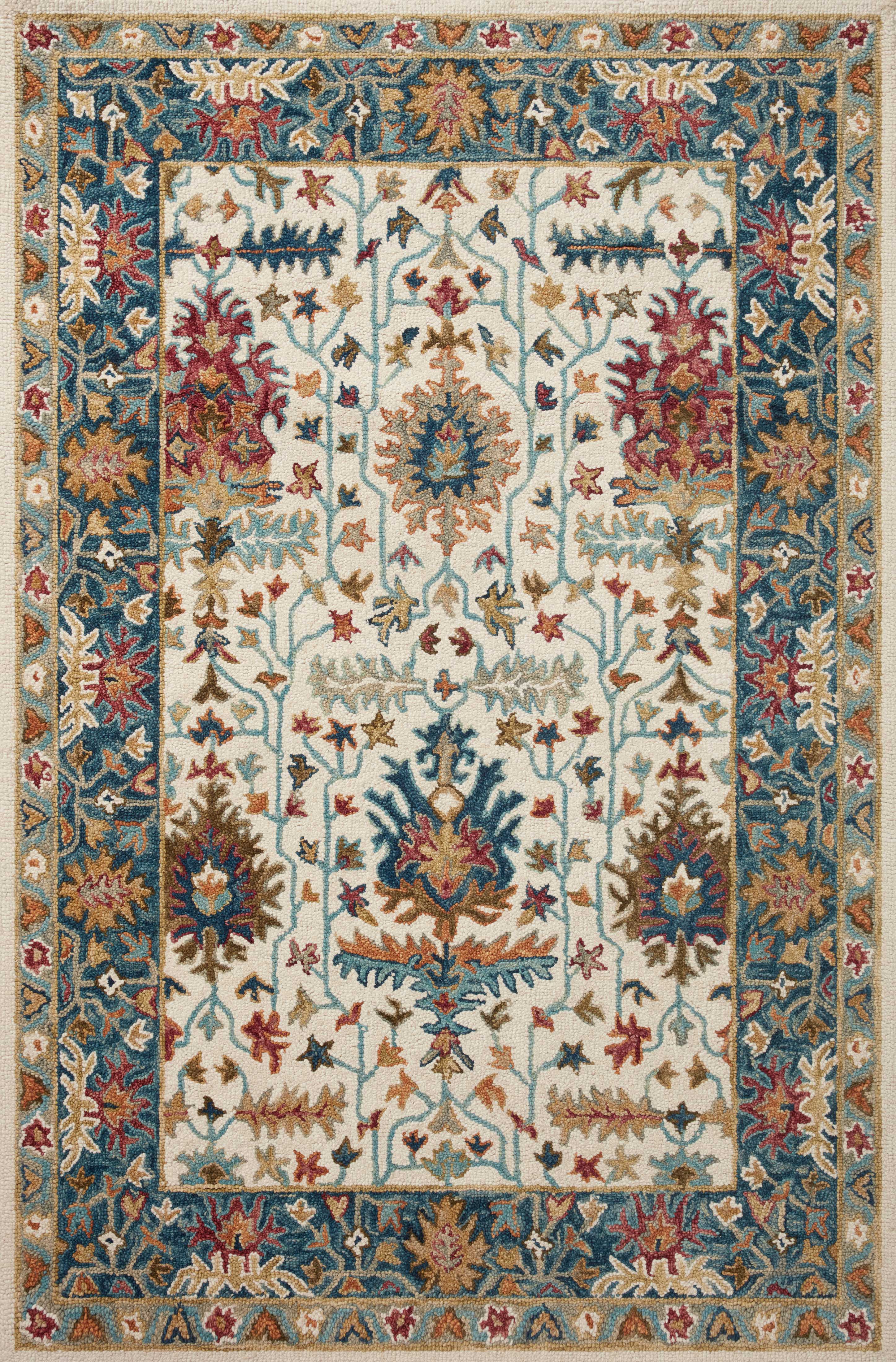 Layered in refined ivory and breezy sky-blue hues with traditional patterns, the Victoria VK-23 Ivory / Sky Area Rug is a hooked 100% wool area rug perfect for any setting