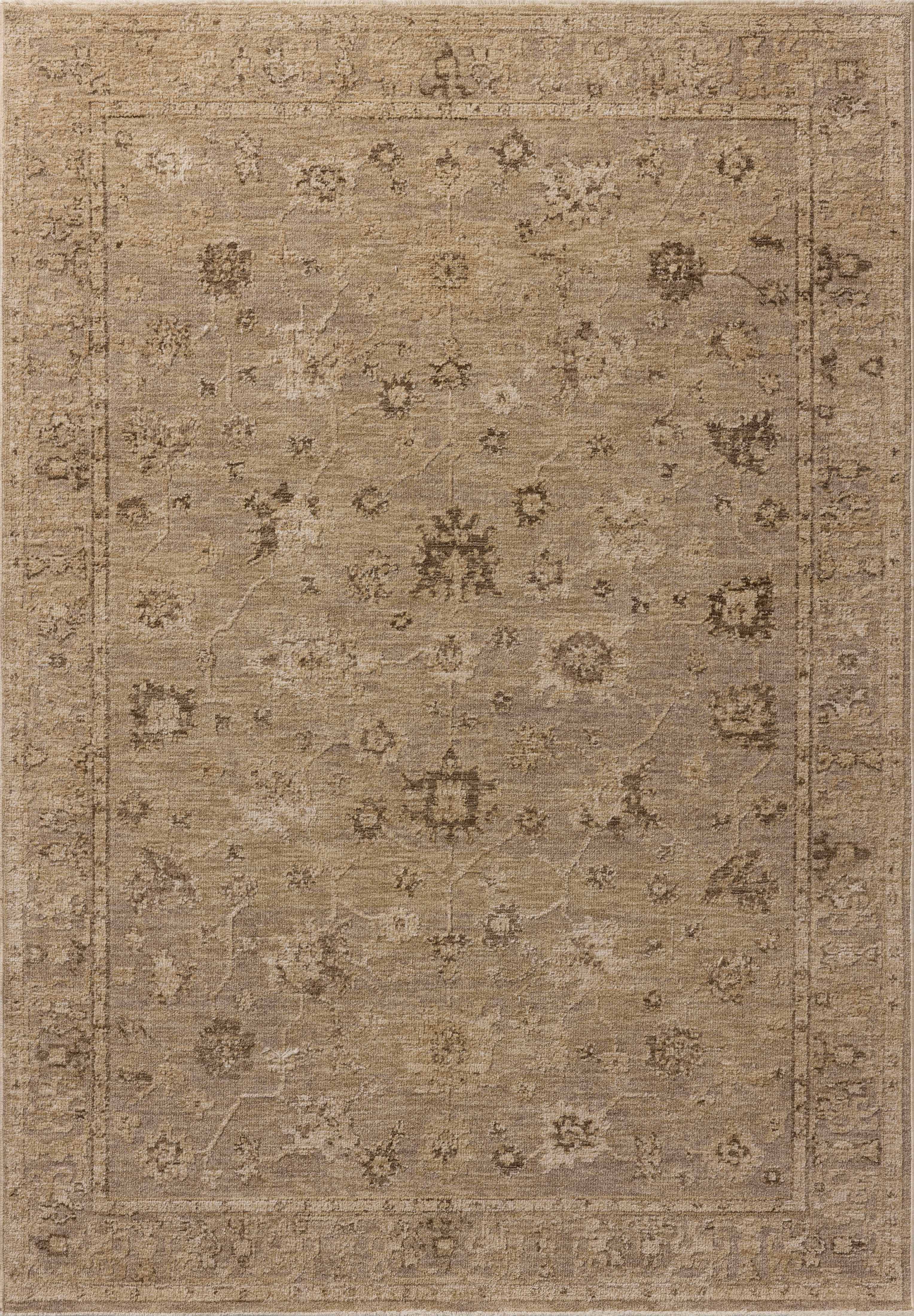 A power-loomed 100% polyester area rug featuring traditional and vintage design and versatile taupe and warm natural tones, the Willa WIA-02 Taupe / Natural Area Rug adds character to any room