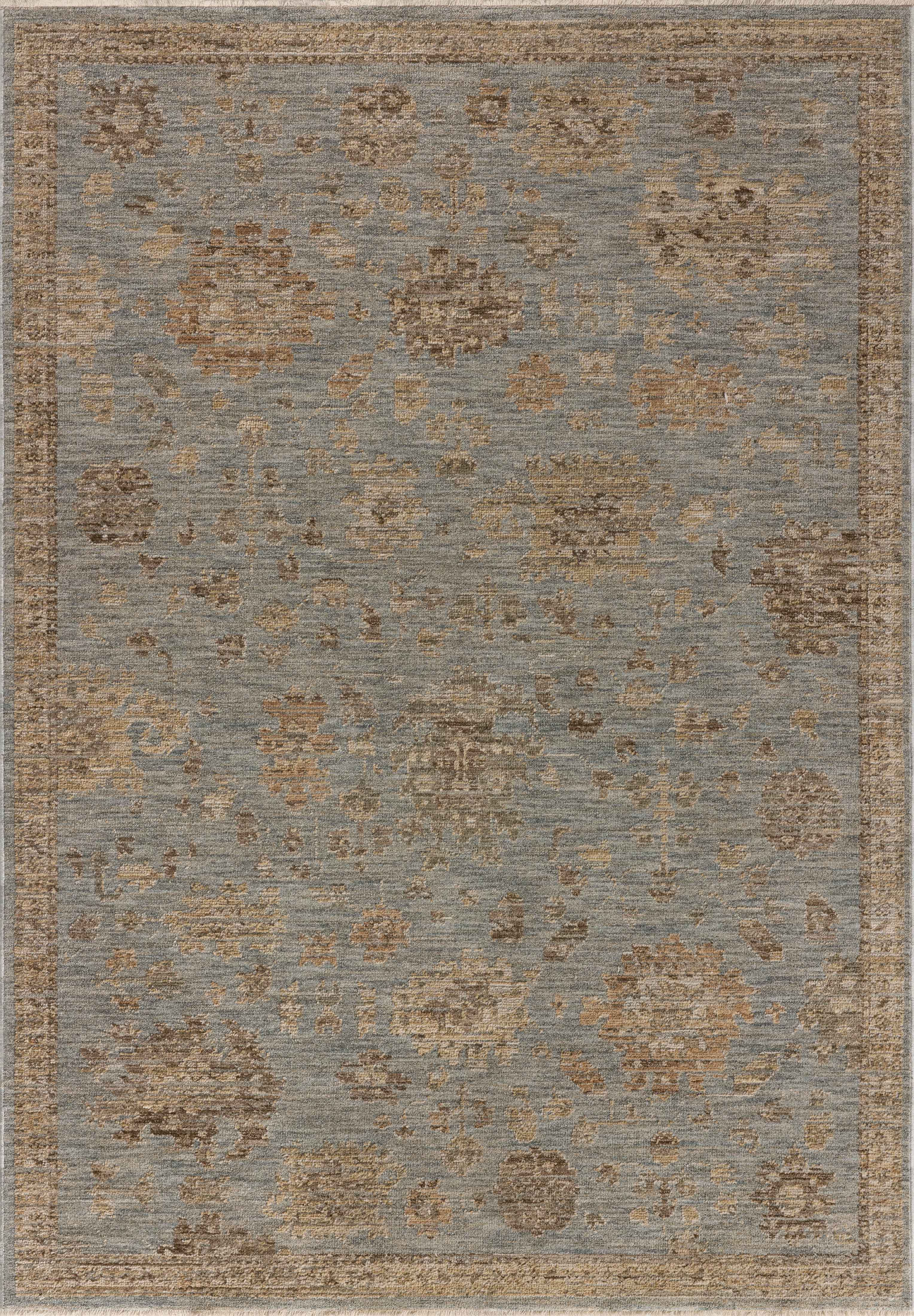 Rich in breezy sky-blue and warm natural hues with traditional and vintage detail, the Willa WIA-03 Sky / Natural Area Rug is a power-loomed 100% polyester area rug built for style and comfort