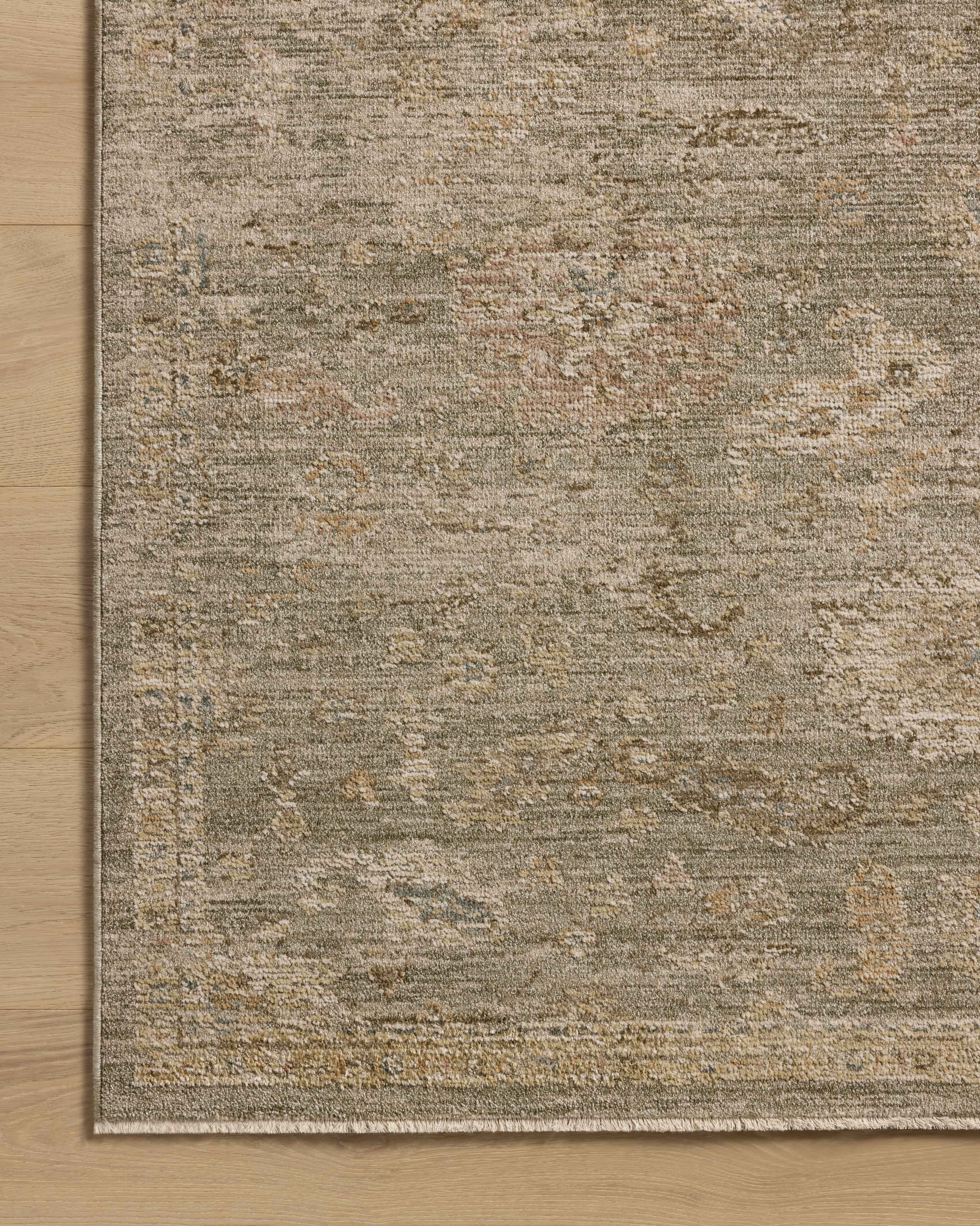 The Willa WIA-06 Sage / Multi Area Rug brings calming sage and vibrant multi-toned character and traditional and vintage flair to your home in a power-loomed 100% polyester area rug