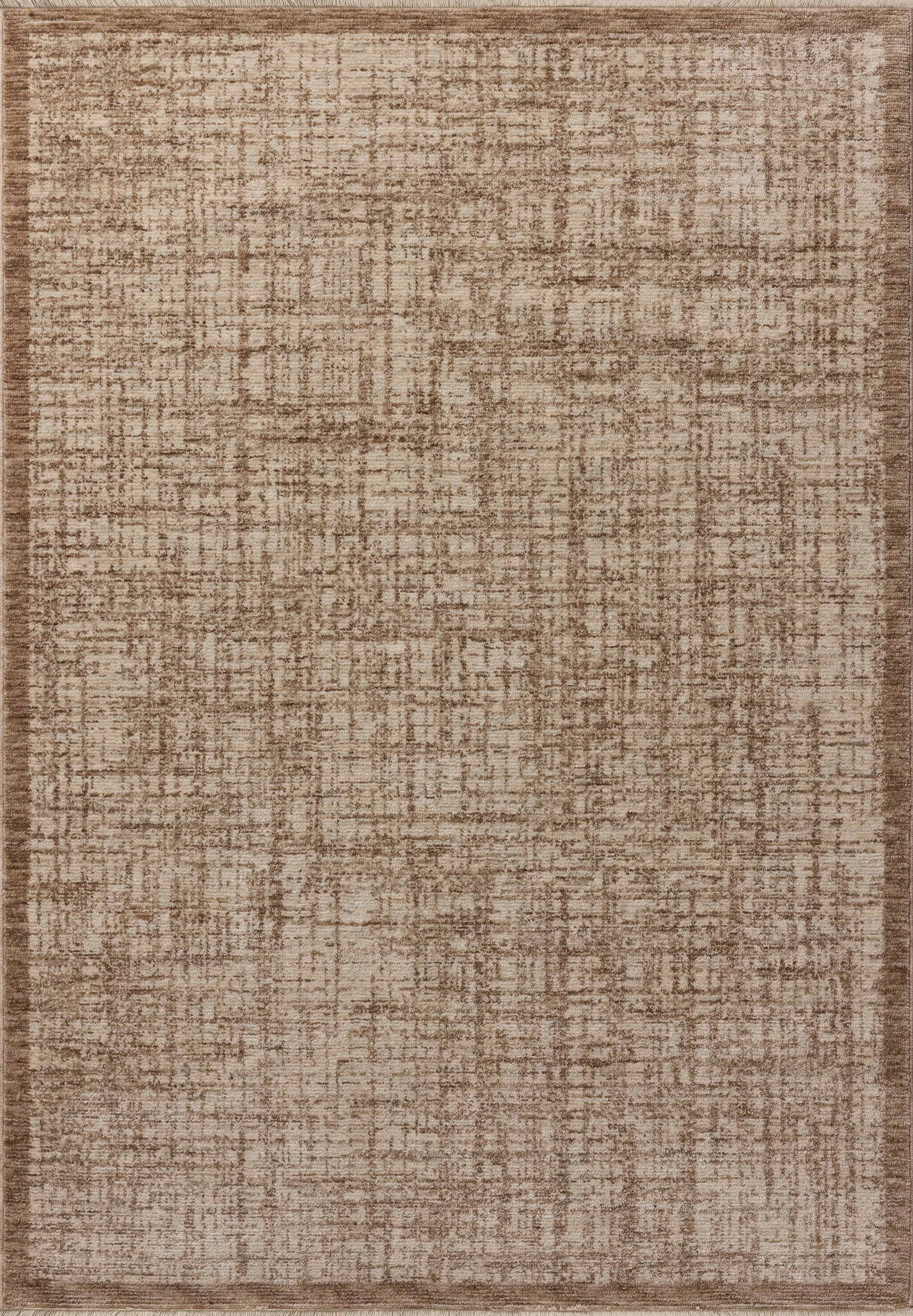The Winston WIT-01 Earth / Bone Area Rug is a power-loomed polyester area rug that radiates earthy and bone charm