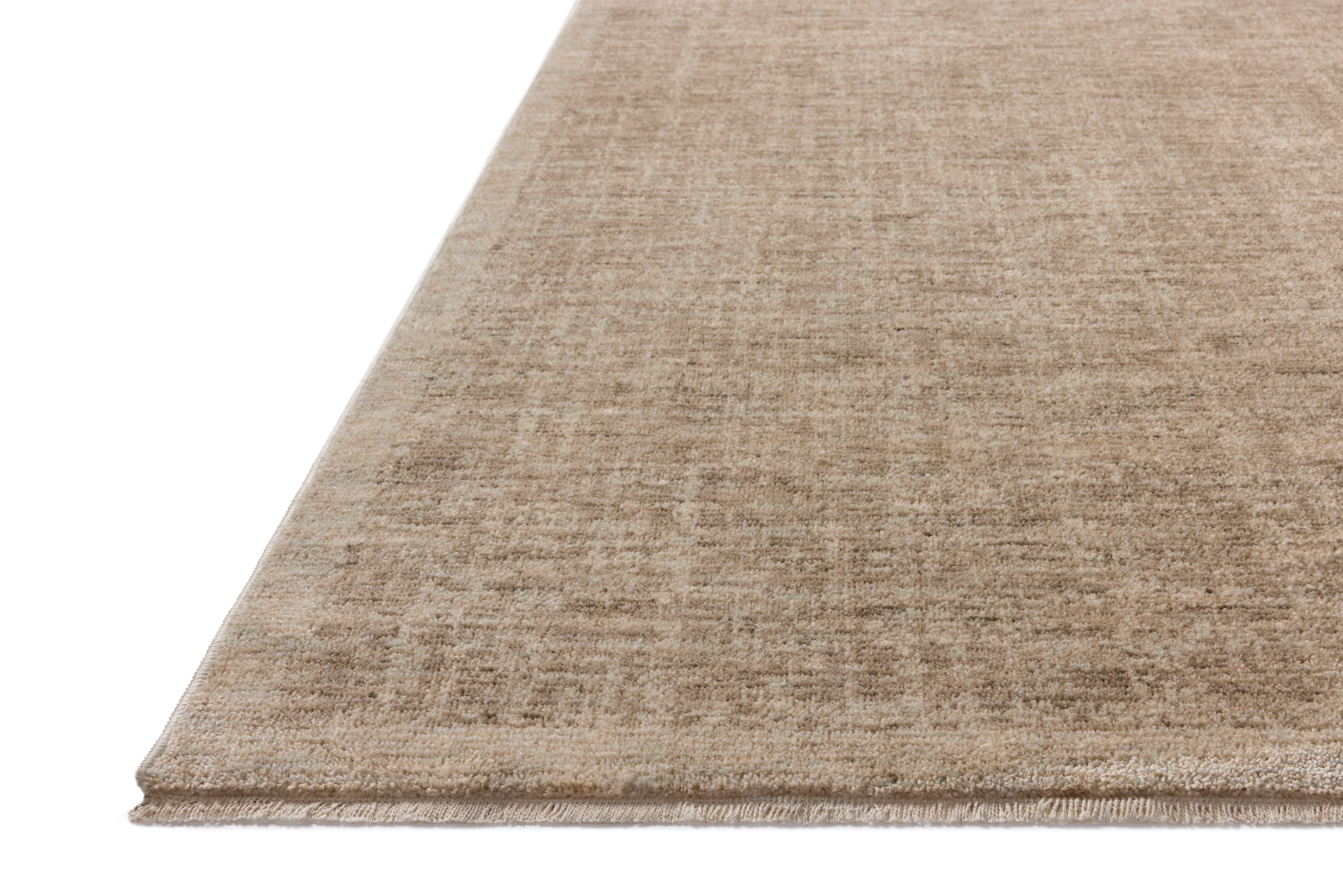The Winston WIT-01 Taupe / Bone Area Rug showcases versatile taupe and bone tones in a power-loomed polyester area rug