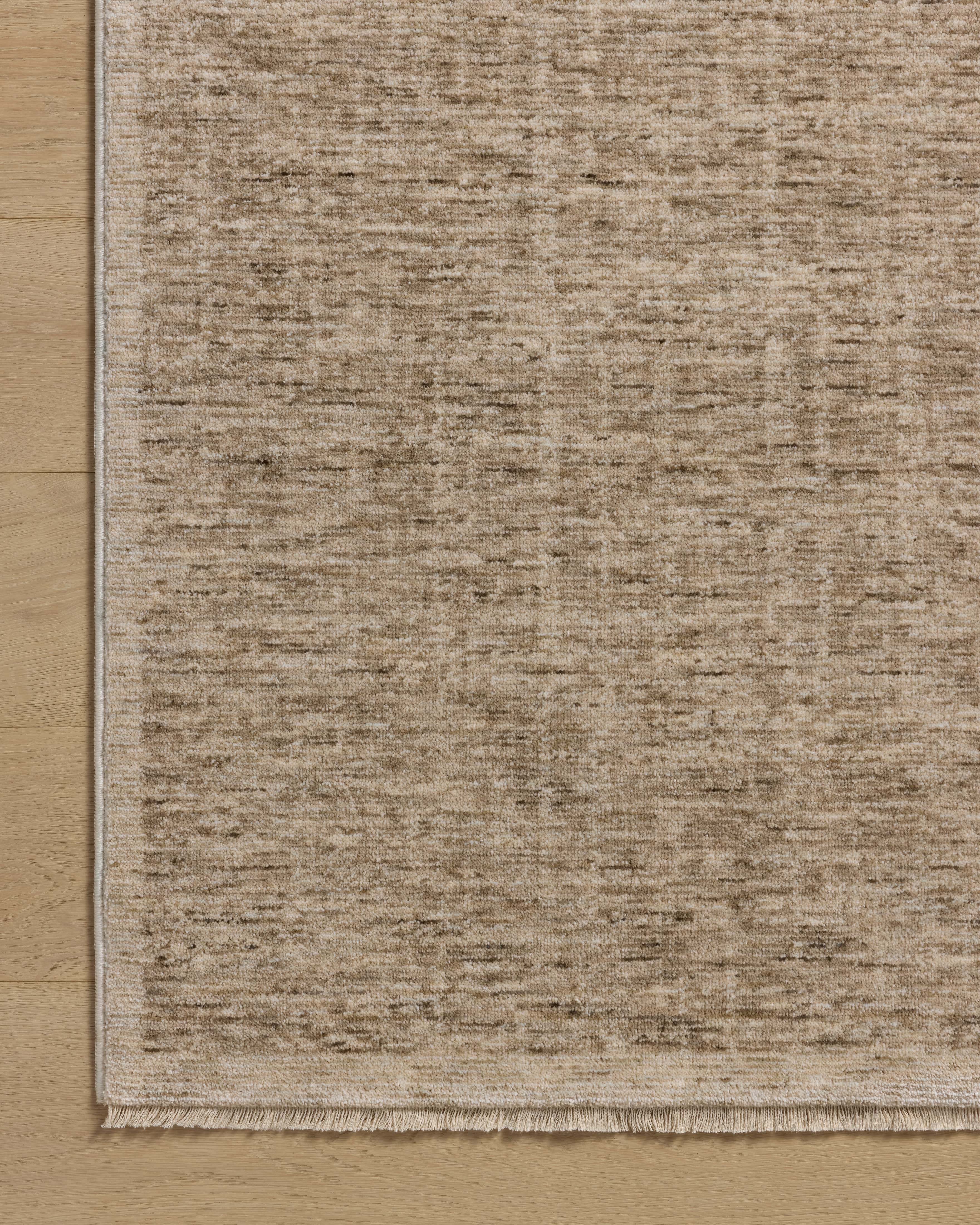 The Winston WIT-01 Taupe / Bone Area Rug showcases versatile taupe and bone tones in a power-loomed polyester area rug