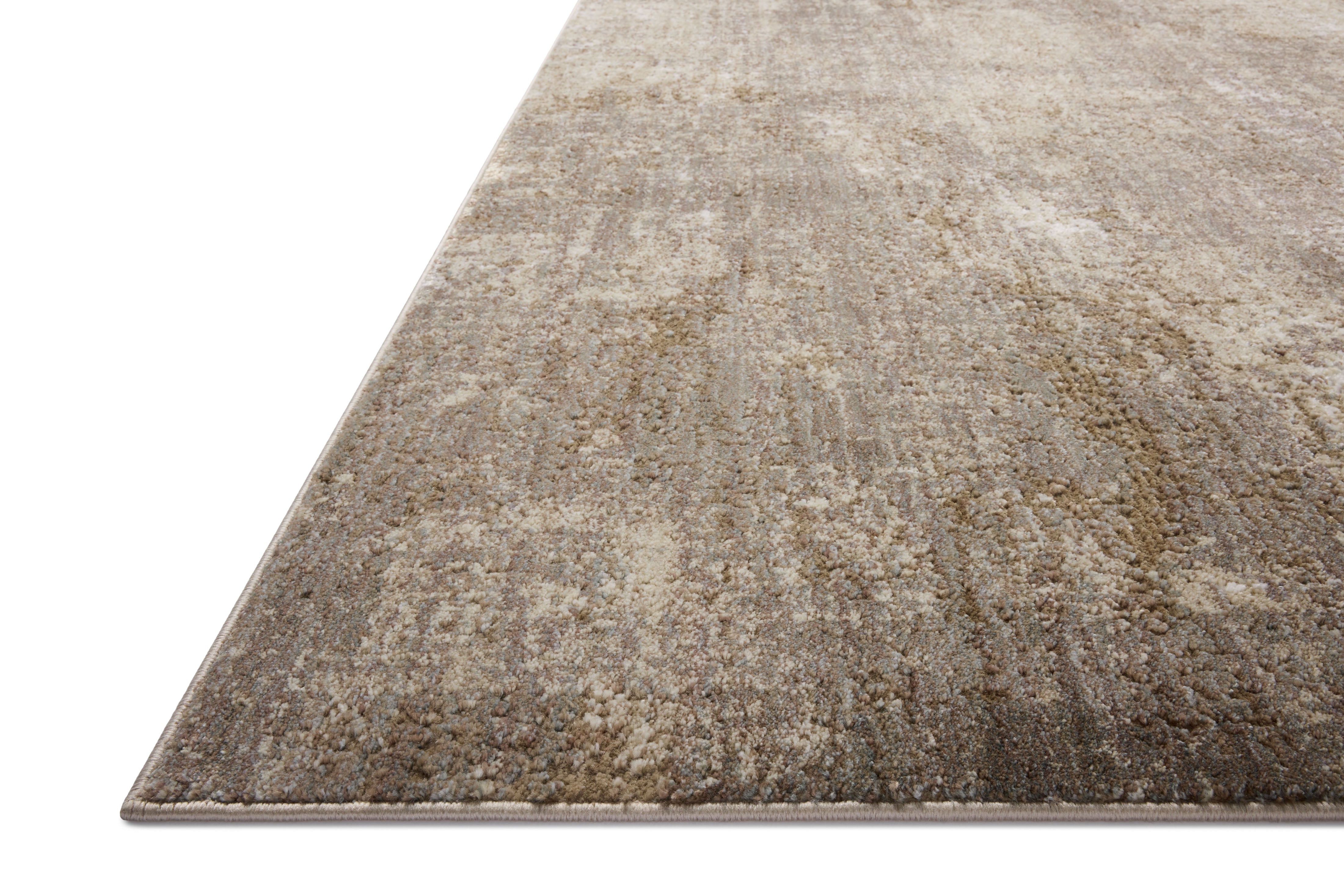 The Wyatt WYA-04 Granite / Natural Area Rug offers striking granite and warm natural sophistication and distressed charm in a power-loomed polypropylene and polyester area rug
