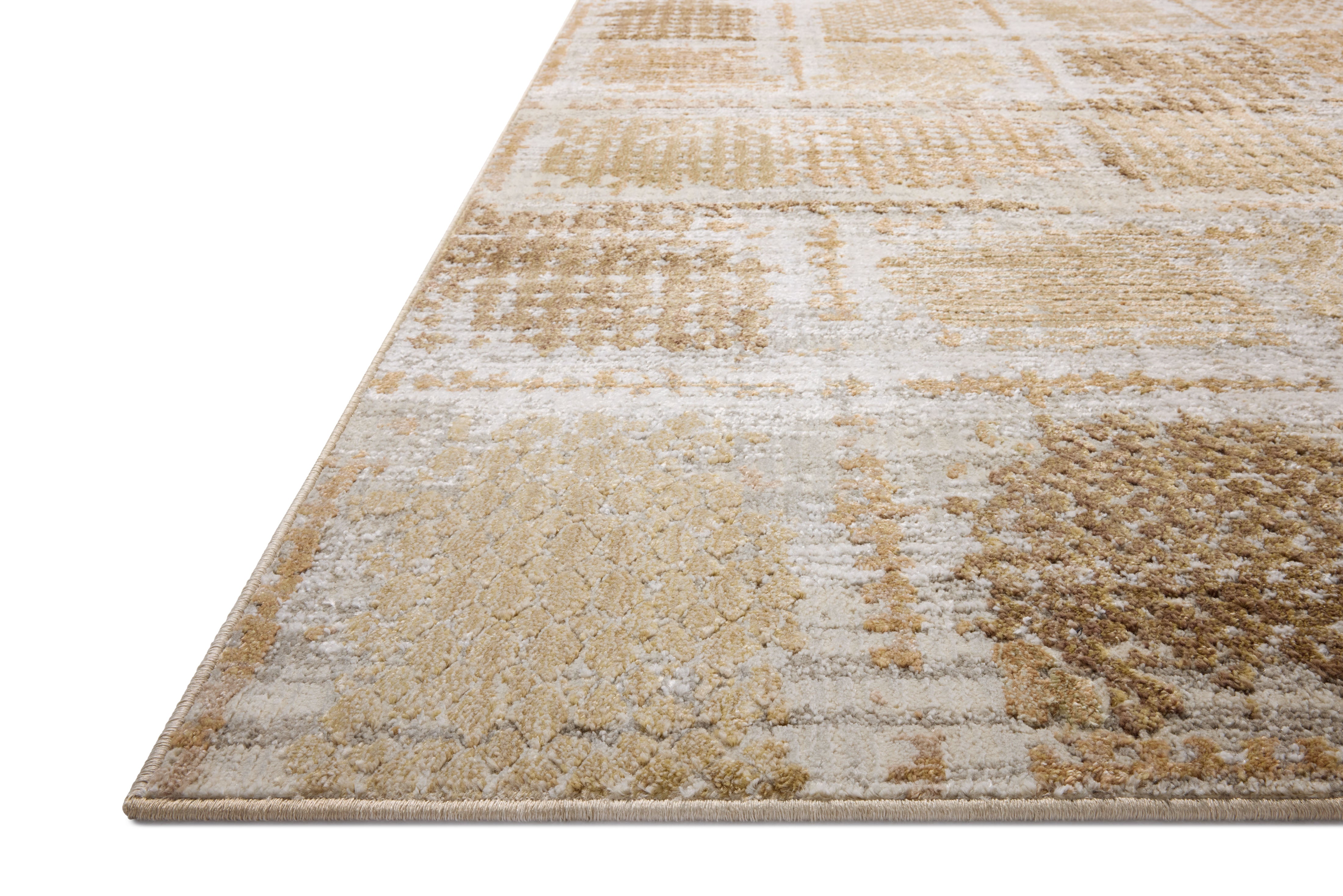Expertly crafted as a power-loomed polypropylene and polyester area rug with distressed artistry, the Wyatt WYA-05 Adobe / Dove Area Rug captures adobe and gentle dove tones beautifully