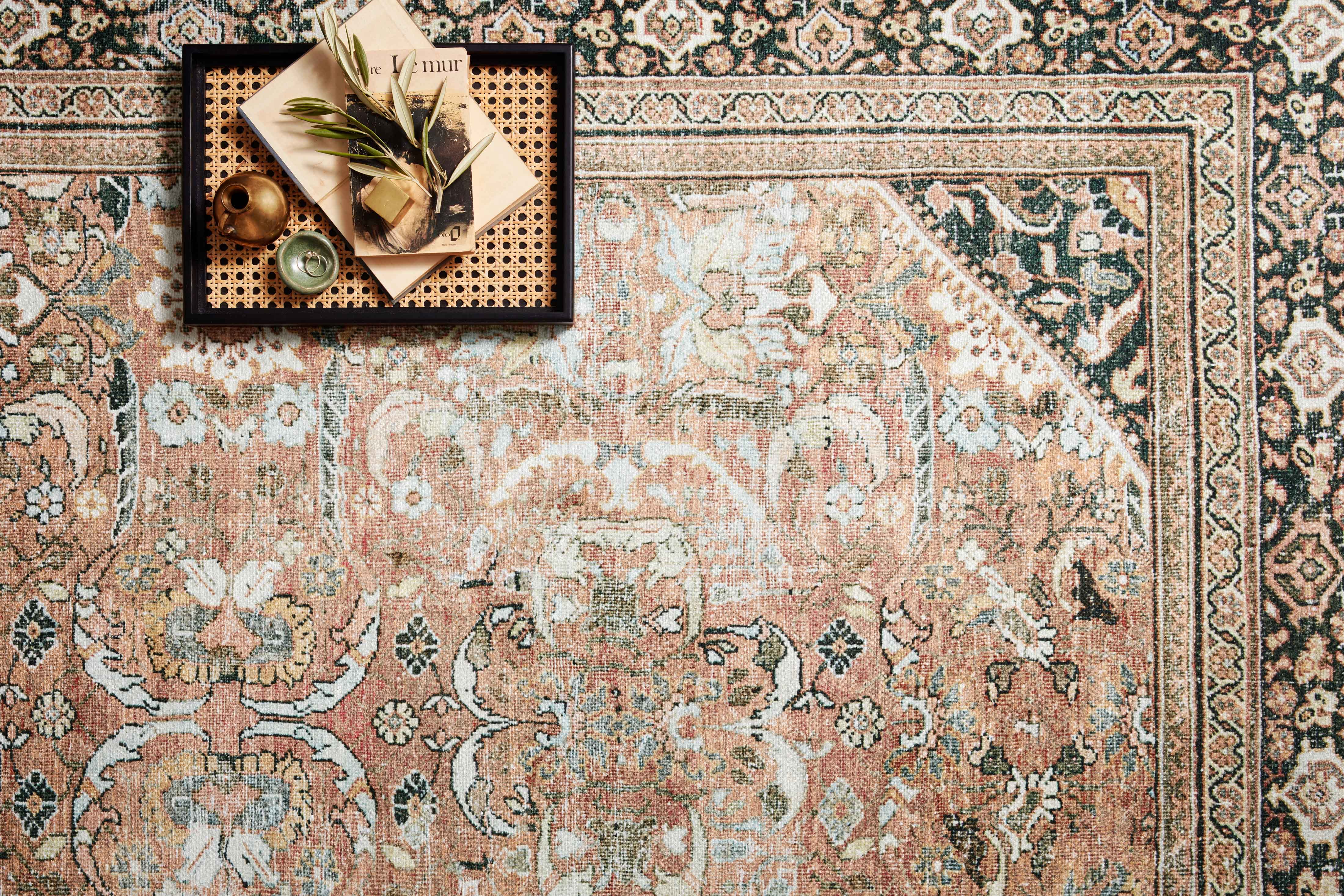 The Wynter WYN-02 Auburn / Multi Area Rug highlights auburn and vibrant multi-toned tones in a beautifully made power-loomed 100% polyester area rug