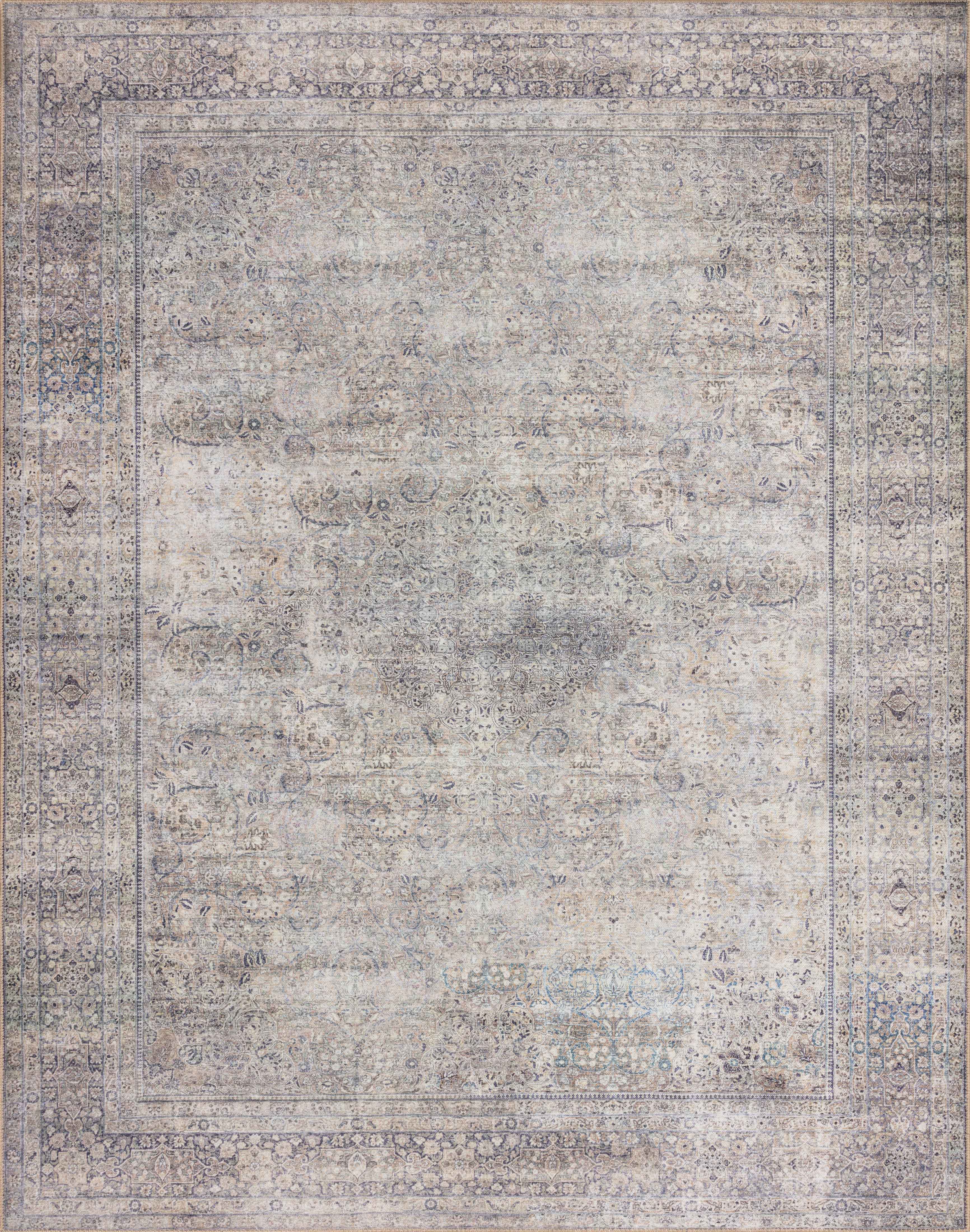 Dressed in shimmering silver and deep charcoal hues, the Wynter WYN-03 Silver / Charcoal Area Rug is a power-loomed 100% polyester area rug that completes any room