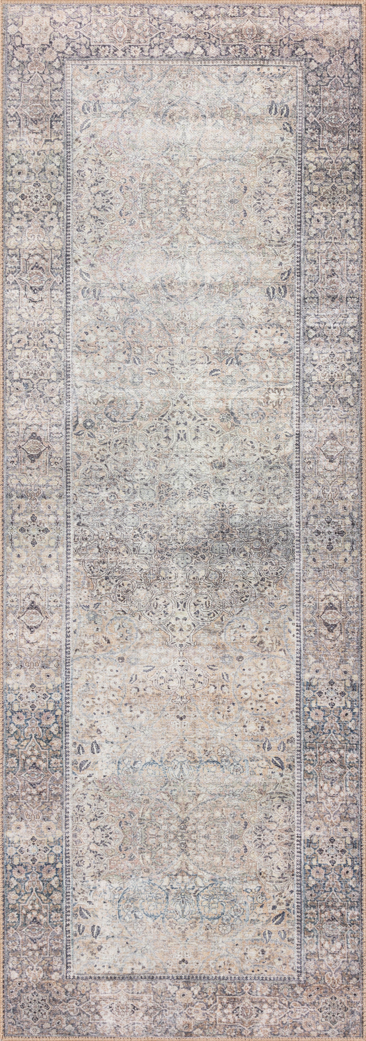 Dressed in shimmering silver and deep charcoal hues, the Wynter WYN-03 Silver / Charcoal Area Rug is a power-loomed 100% polyester area rug that completes any room