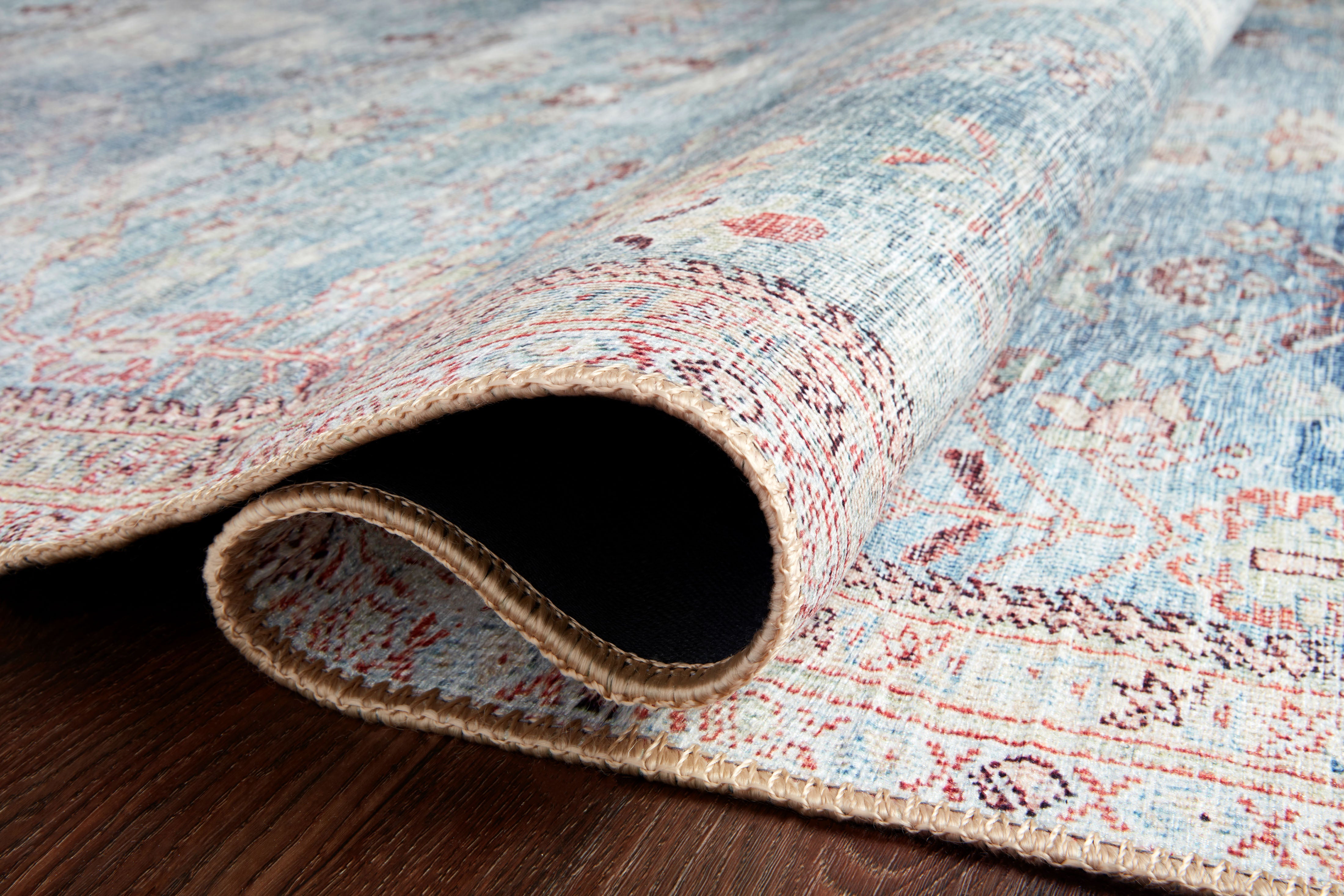 The Wynter WYN-06 Teal / Multi Area Rug is a power-loomed 100% polyester area rug that radiates vibrant teal and vibrant multi-toned charm