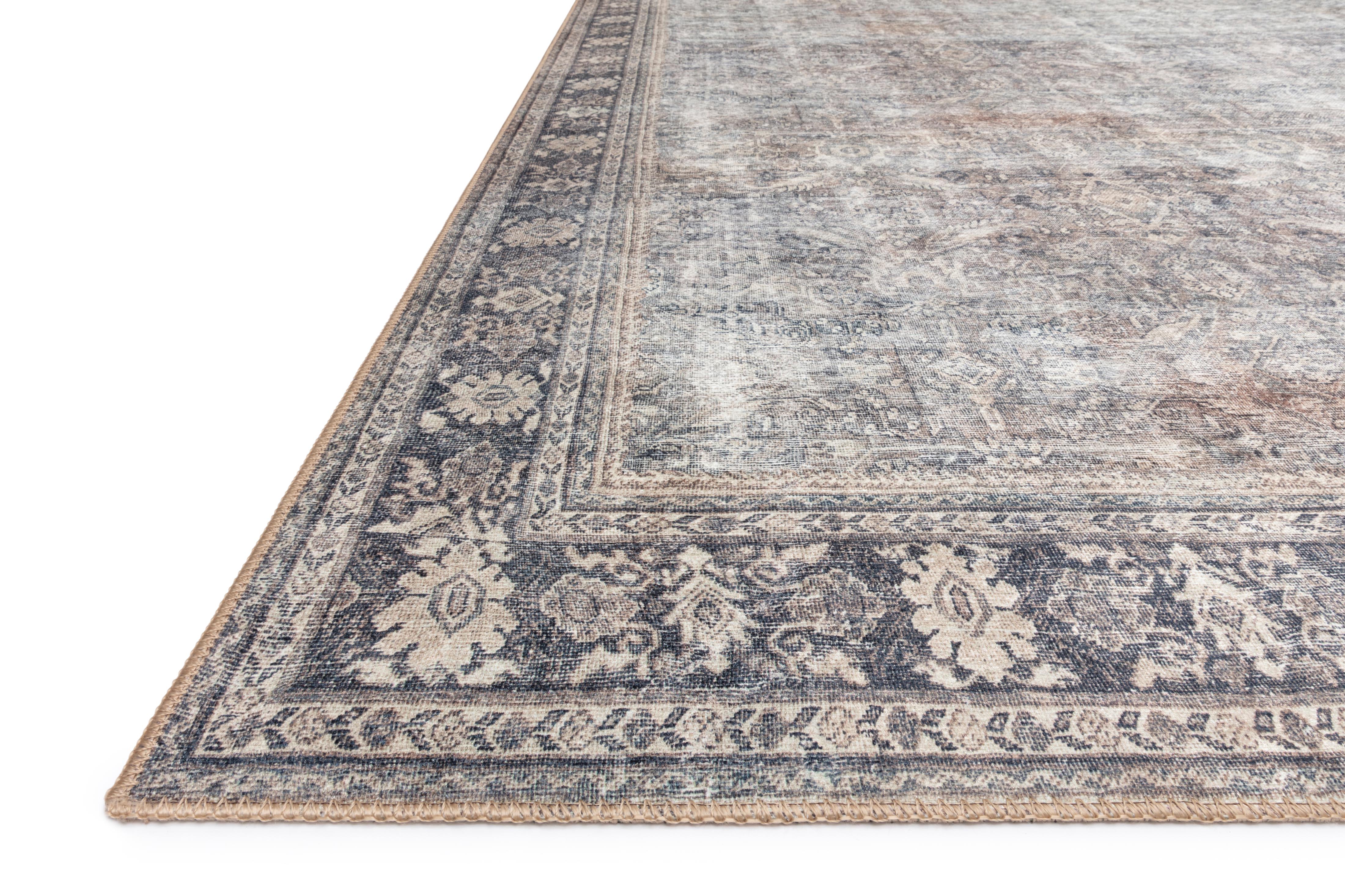 Layered in elegant grey and deep charcoal hues, the Wynter WYN-07 Grey / Charcoal Area Rug is a power-loomed 100% polyester area rug perfect for any setting