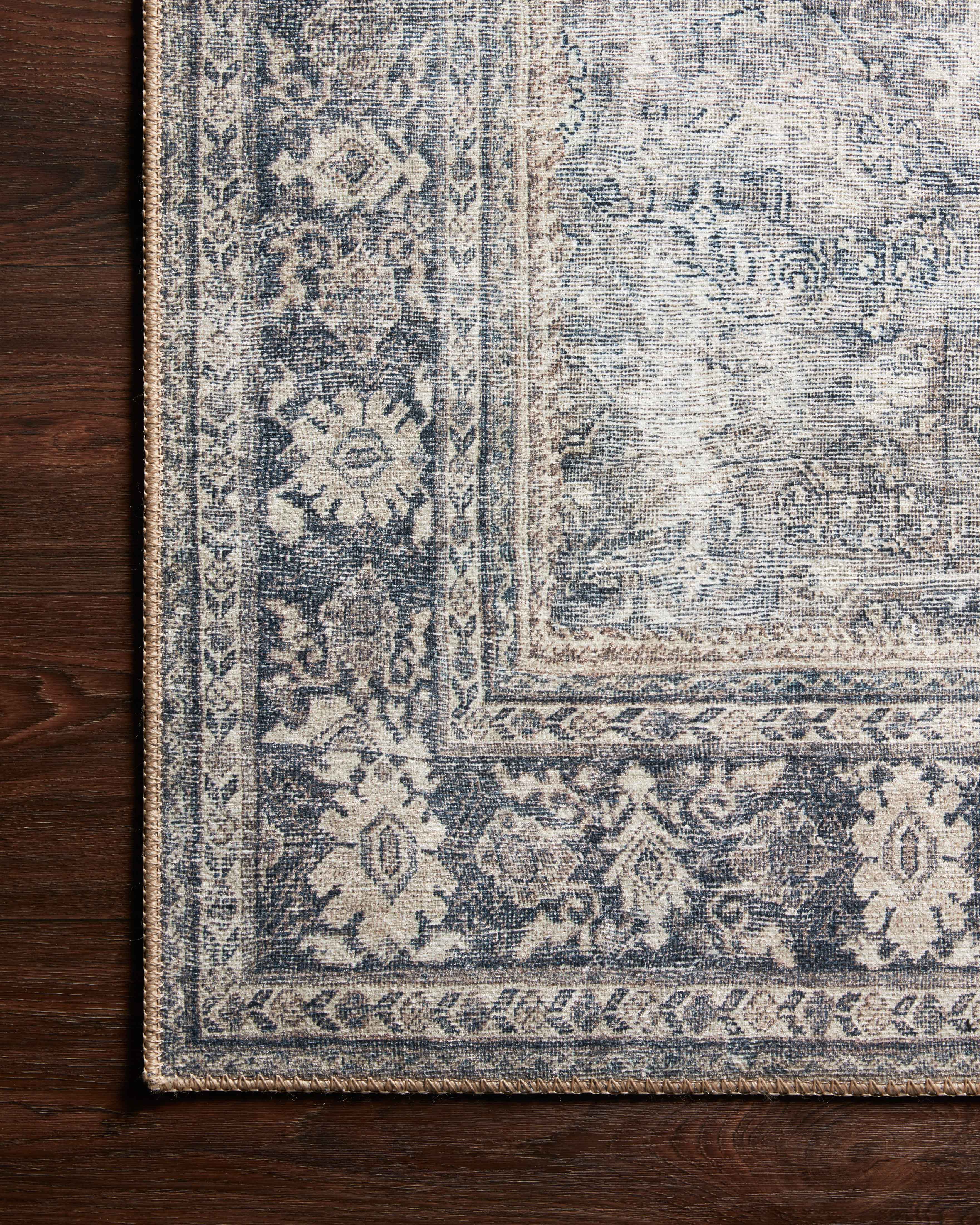 Layered in elegant grey and deep charcoal hues, the Wynter WYN-07 Grey / Charcoal Area Rug is a power-loomed 100% polyester area rug perfect for any setting