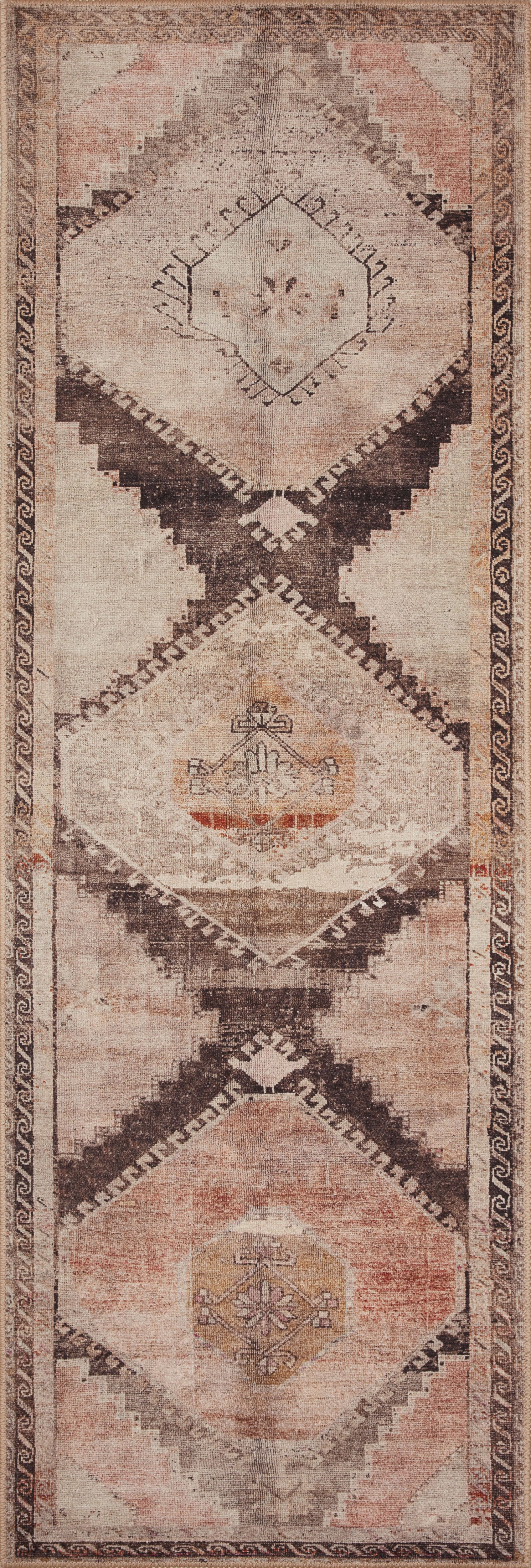 The Wynter WYN-08 Graphite / Blush Area Rug showcases graphite and delicate blush tones in a power-loomed 100% polyester area rug