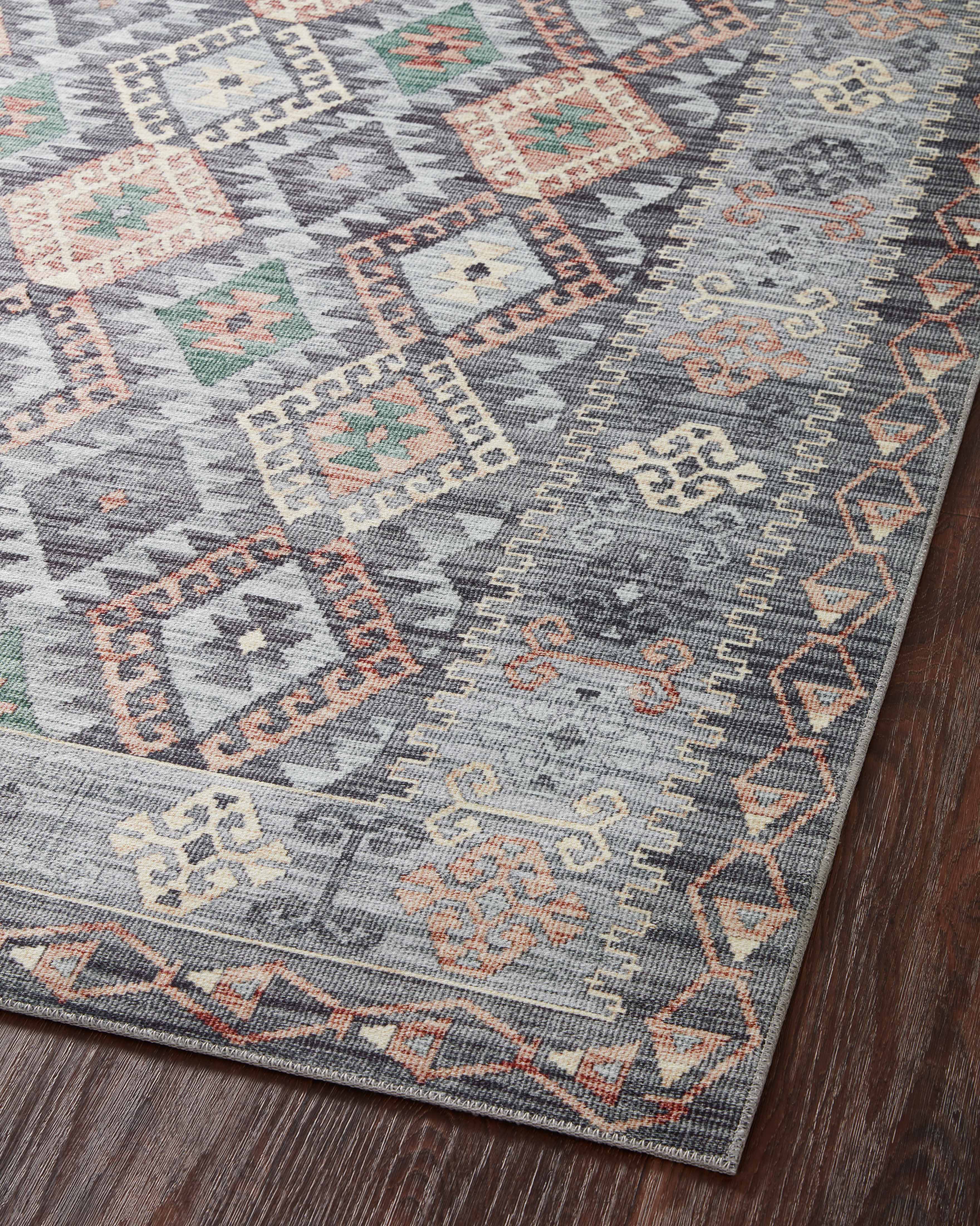 Finished in elegant grey and vibrant multi-toned tones, the Zion ZIO-01 Grey / Multi Area Rug is a power-loomed 100% polyester area rug for modern living