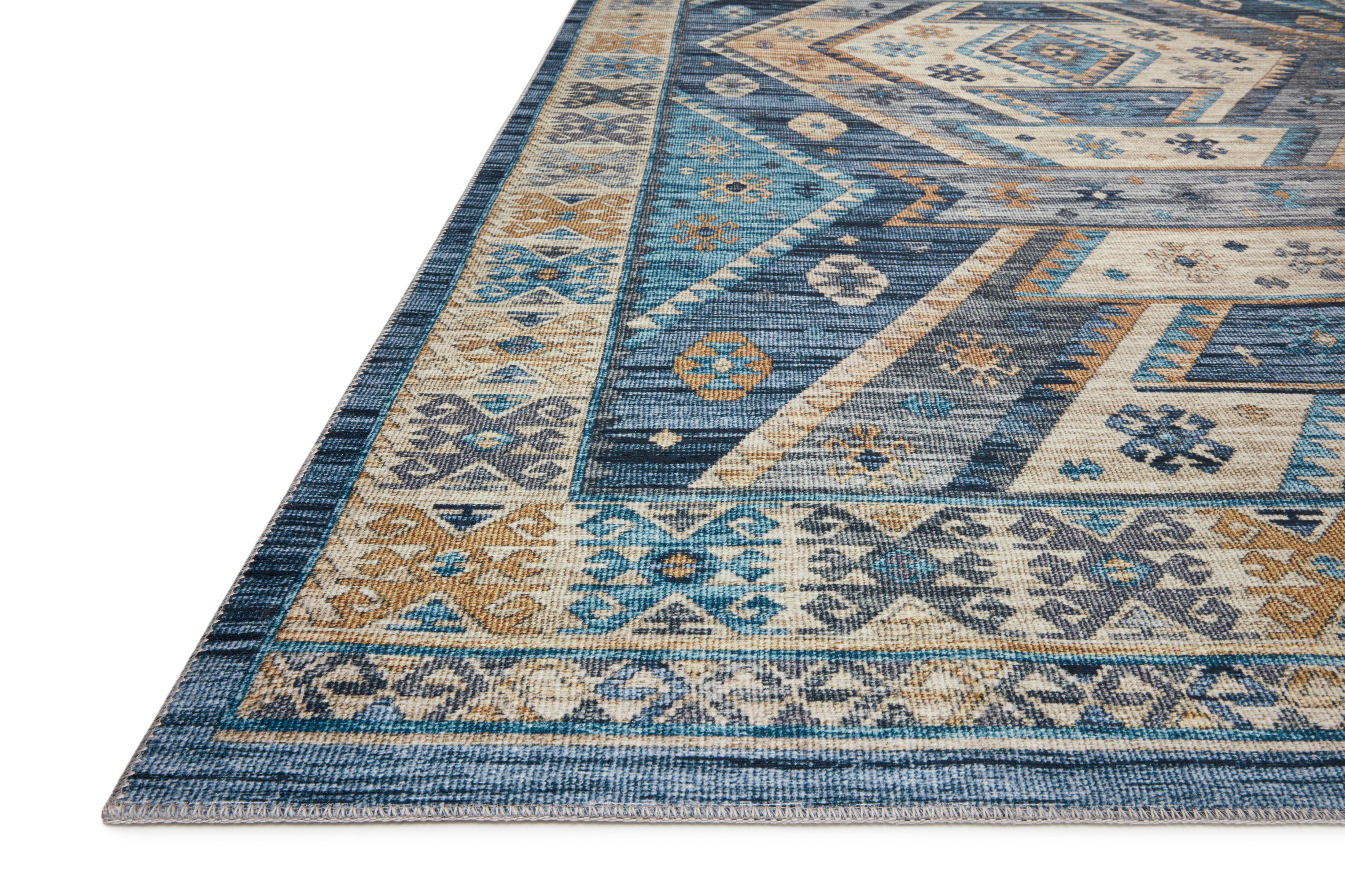 A power-loomed 100% polyester area rug in serene ocean and radiant gold hues, the Zion ZIO-02 Ocean / Gold Area Rug is a standout in any décor
