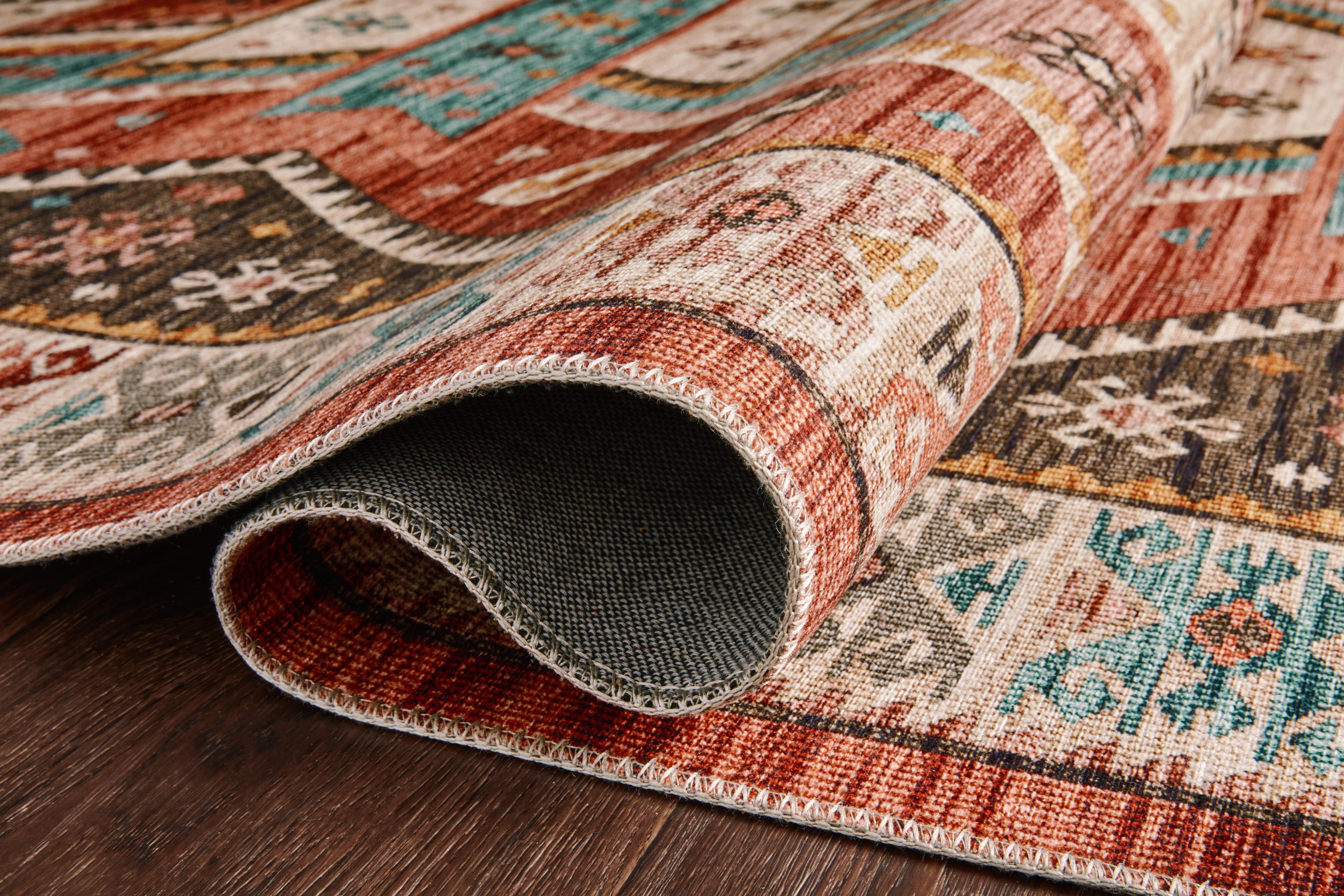 The Zion ZIO-05 Red / Multi Area Rug transforms any space with bold red and vibrant multi-toned tones in a power-loomed 100% polyester area rug