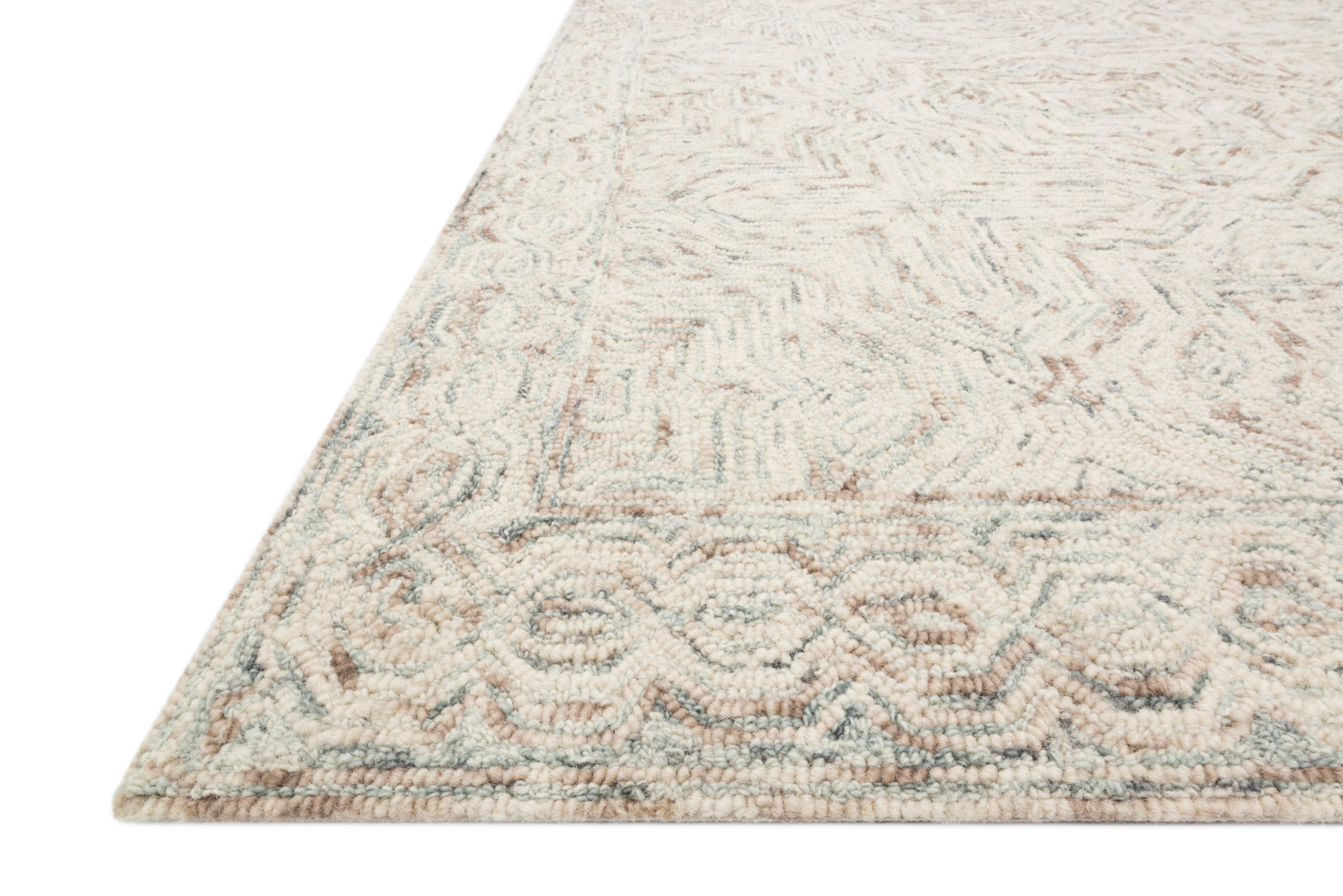 The Ziva ZV-01 Neutral Area Rug is a hand-tufted 100% wool area rug that radiates neutral charm and contemporary and linear elegance