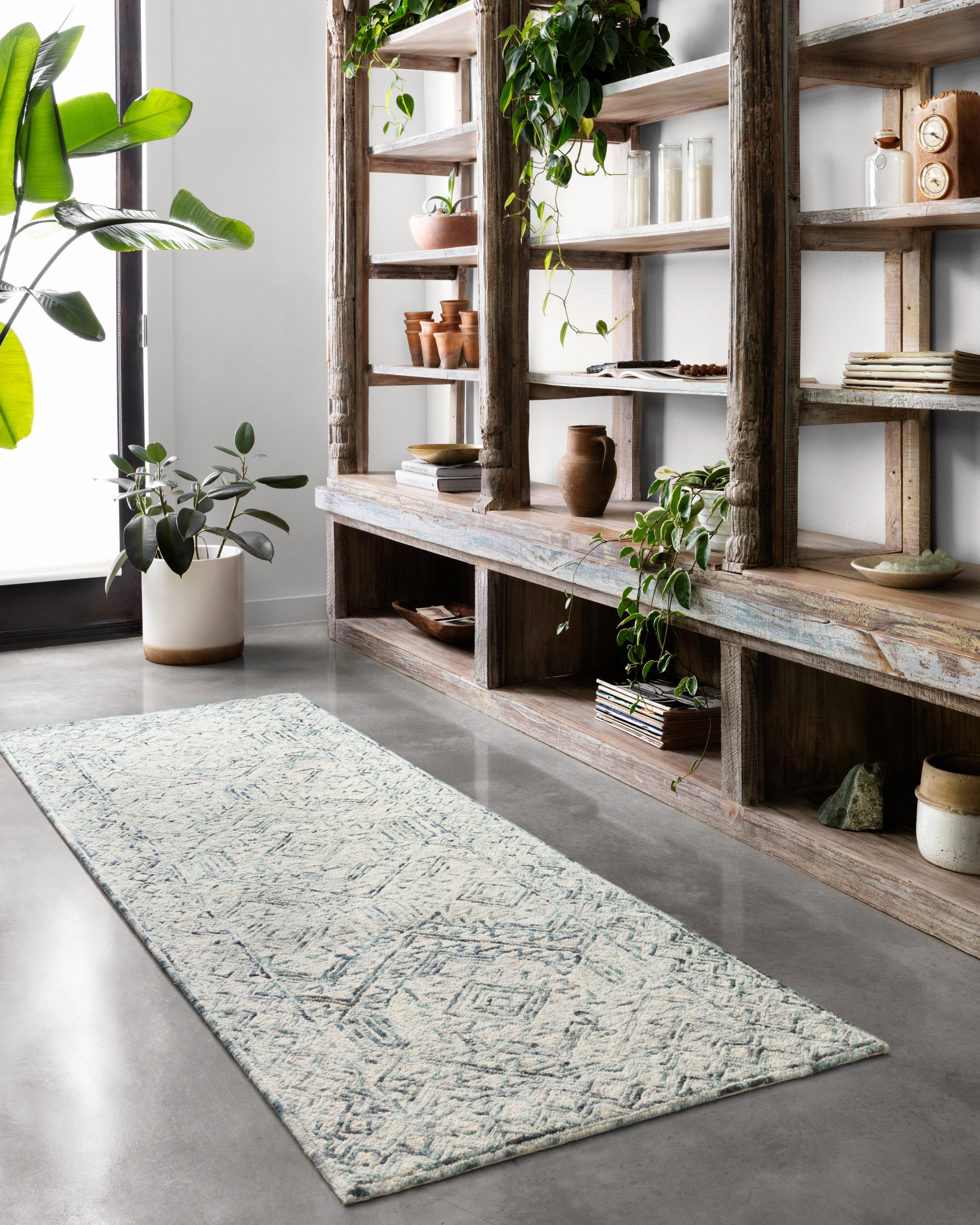 The Ziva ZV-03 Bluestone Area Rug showcases bluestone tones in a hand-tufted 100% wool area rug with contemporary and linear style