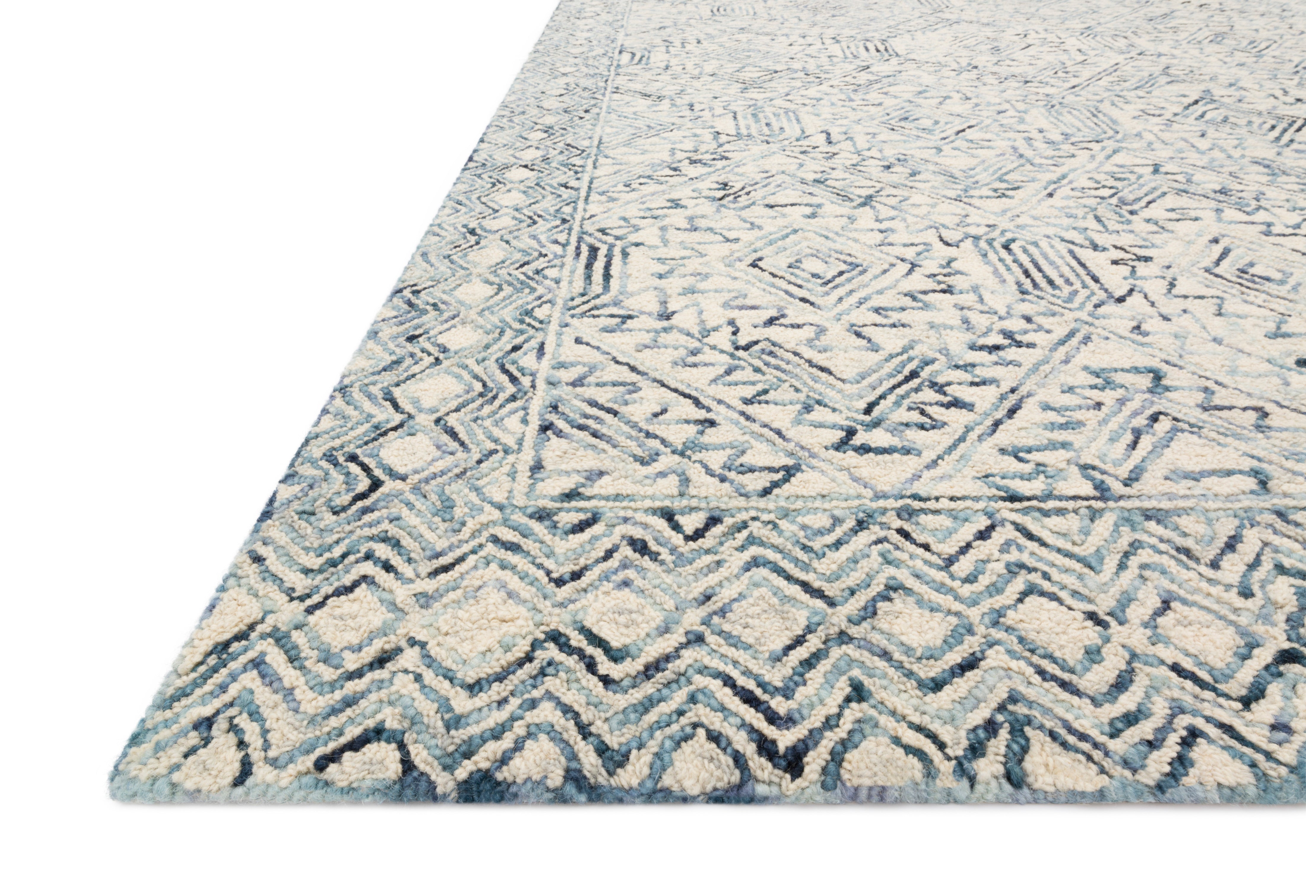 The Ziva ZV-03 Bluestone Area Rug showcases bluestone tones in a hand-tufted 100% wool area rug with contemporary and linear style