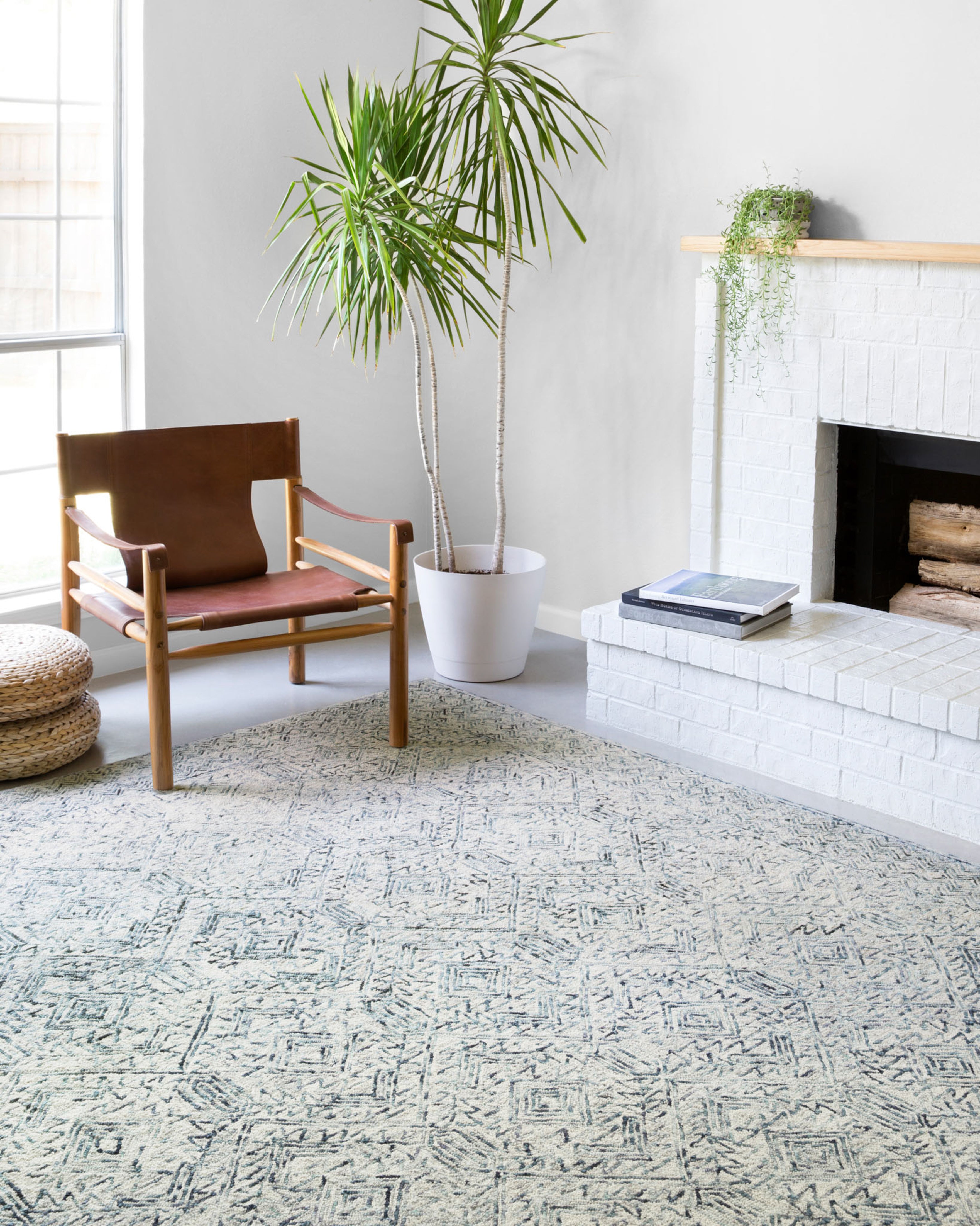 The Ziva ZV-03 Bluestone Area Rug showcases bluestone tones in a hand-tufted 100% wool area rug with contemporary and linear style