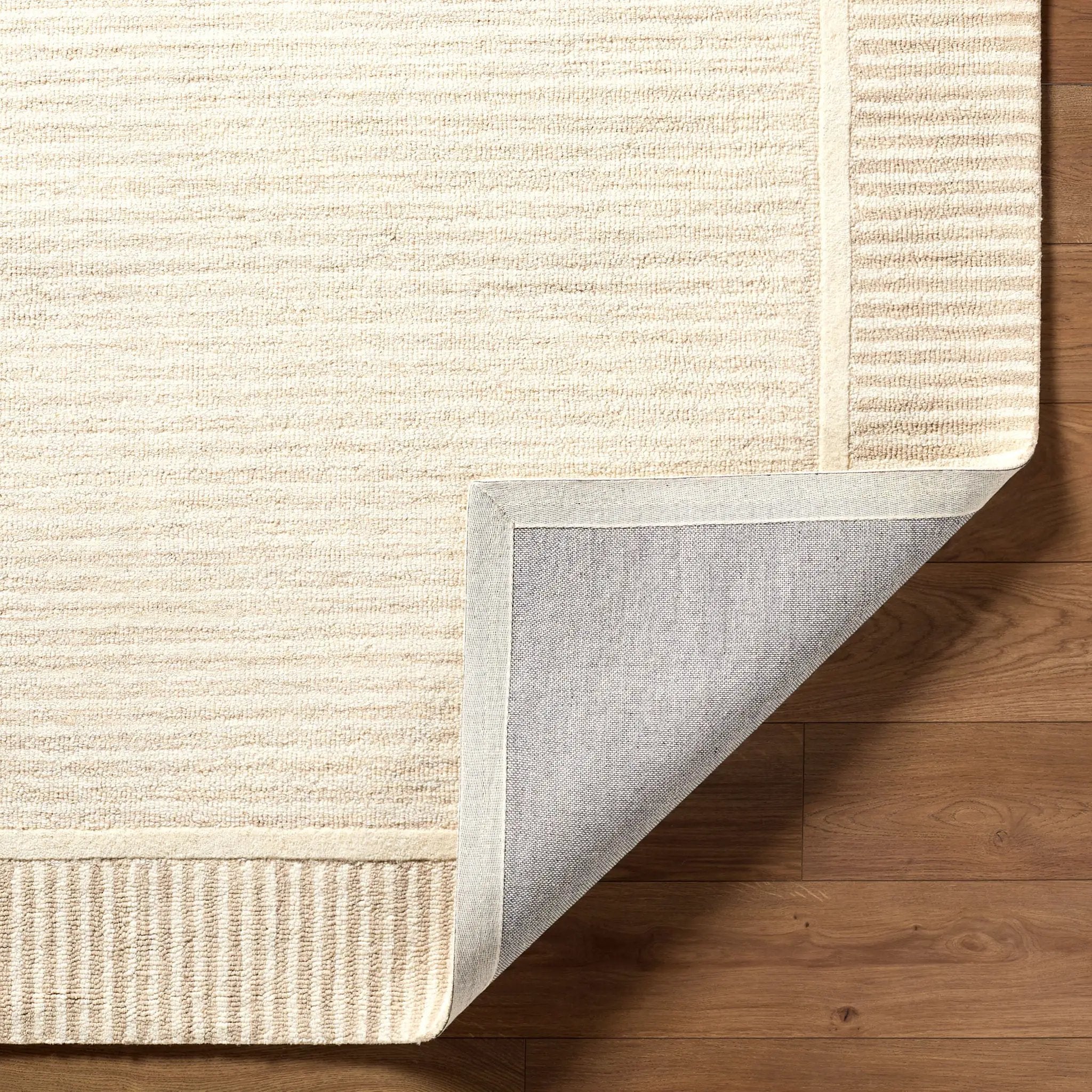 Benchcraft BEC-2307 Taupe Area Rug by LIVABLISS