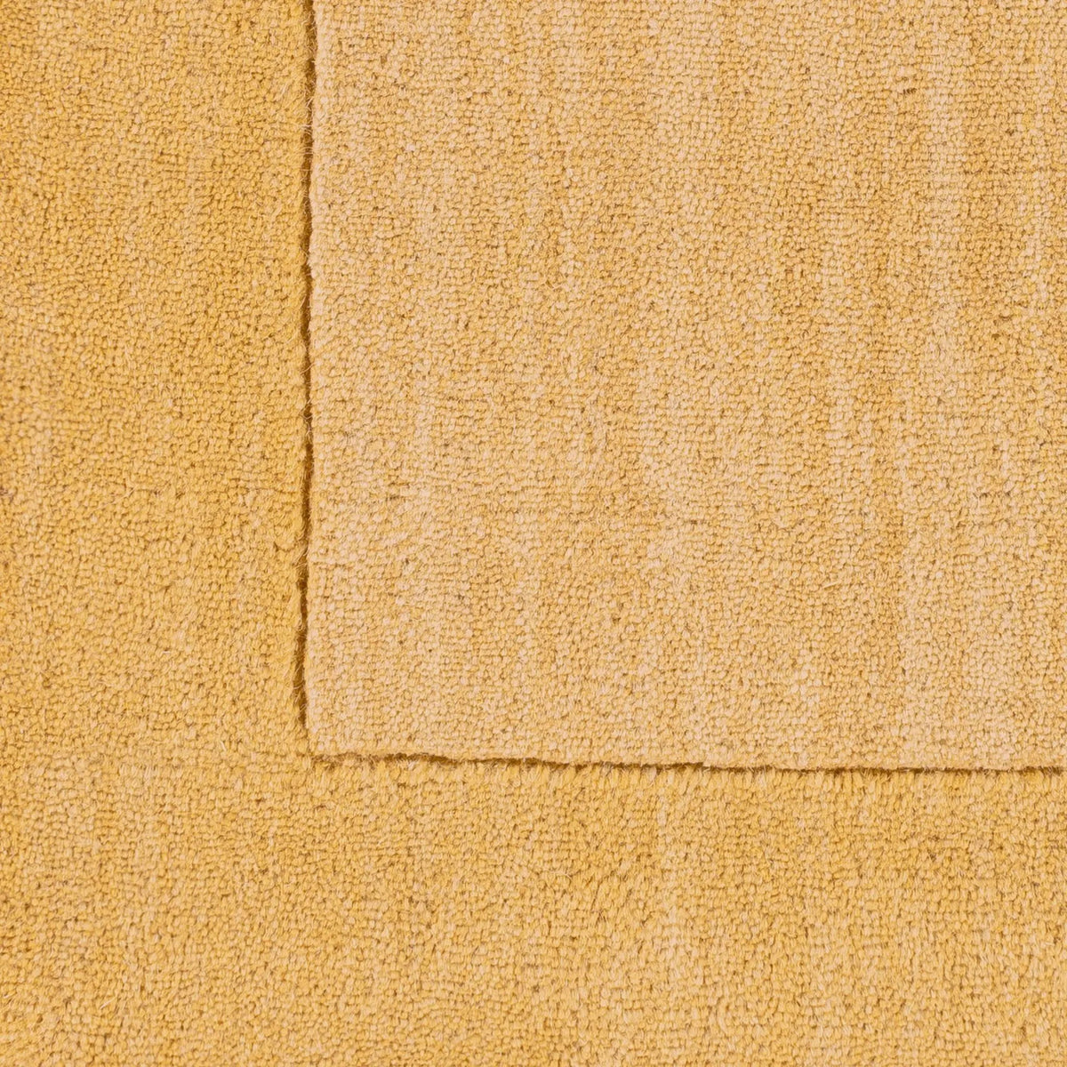 Close-up texture of the Livabliss Mystique M-345 camel color area rug, featuring warm tones and traditional hand-loomed weave for modern interiors.