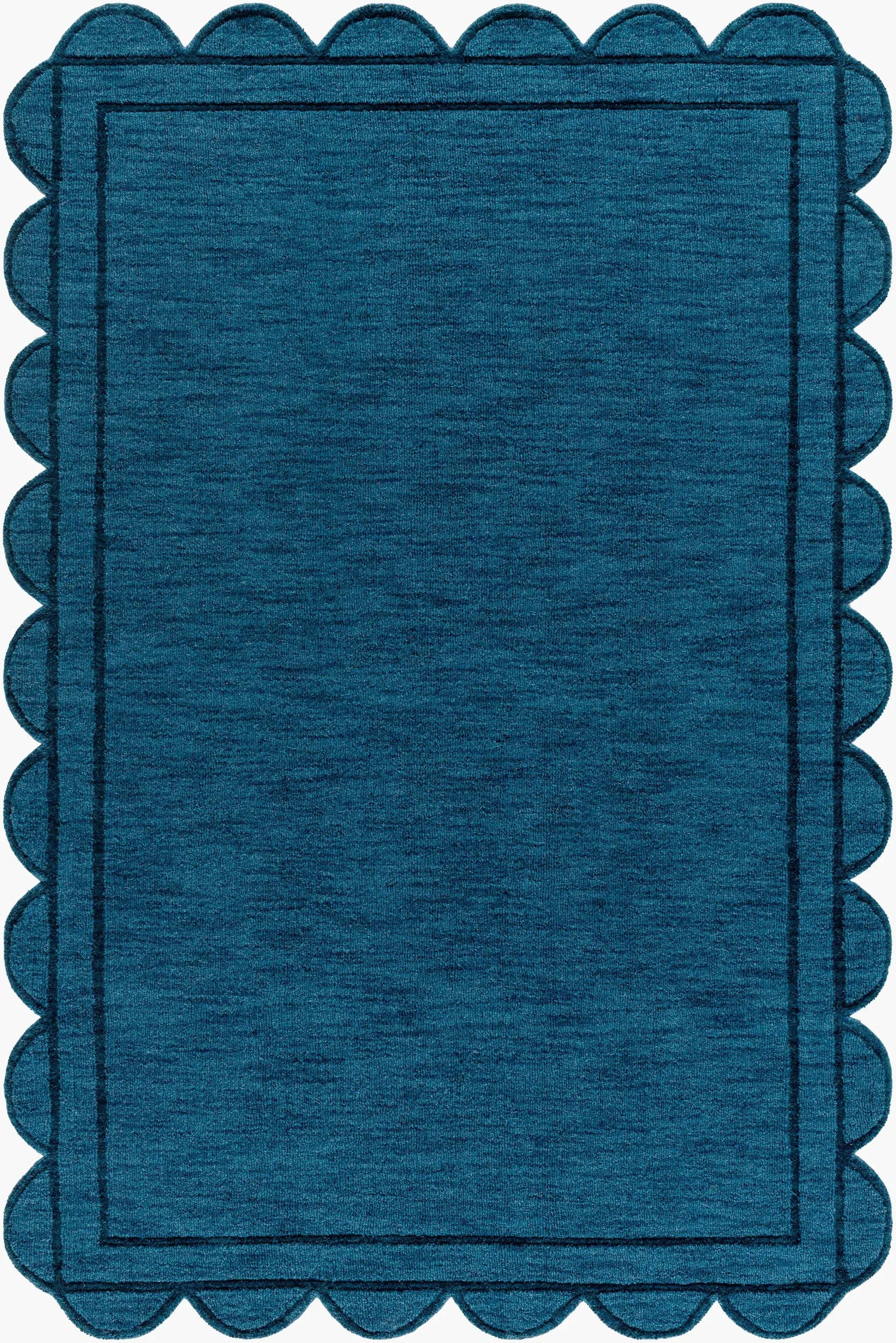 Livabliss Mystique M-5493 Indigo hand loomed wool area rug with scalloped edges and dark border, featuring textured medium-pile weave for living spaces.