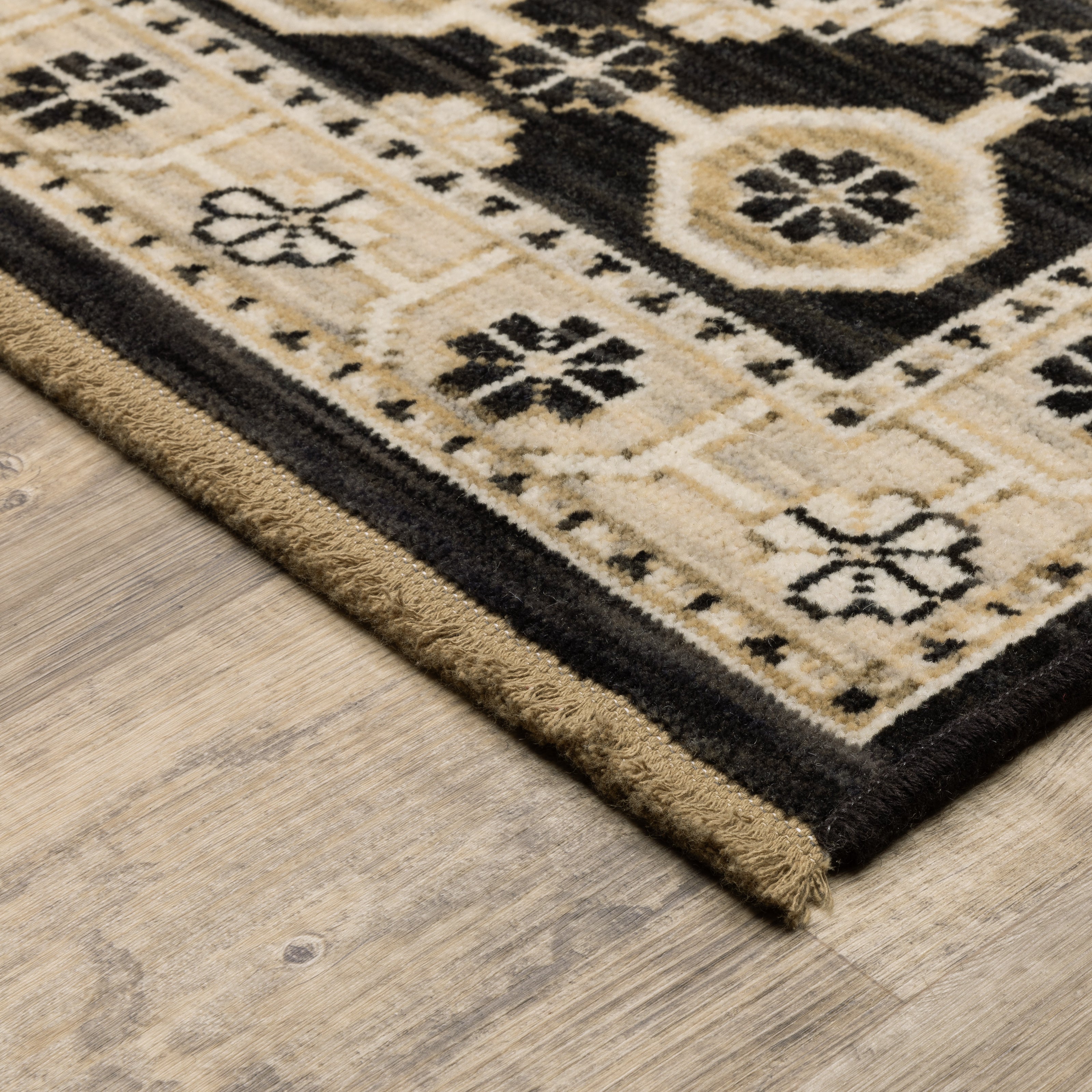 Acacia ACA09 Beige/Black statement area rug with classic pattern, beige and black contrast, earthy accent colors, and cotton fringe.