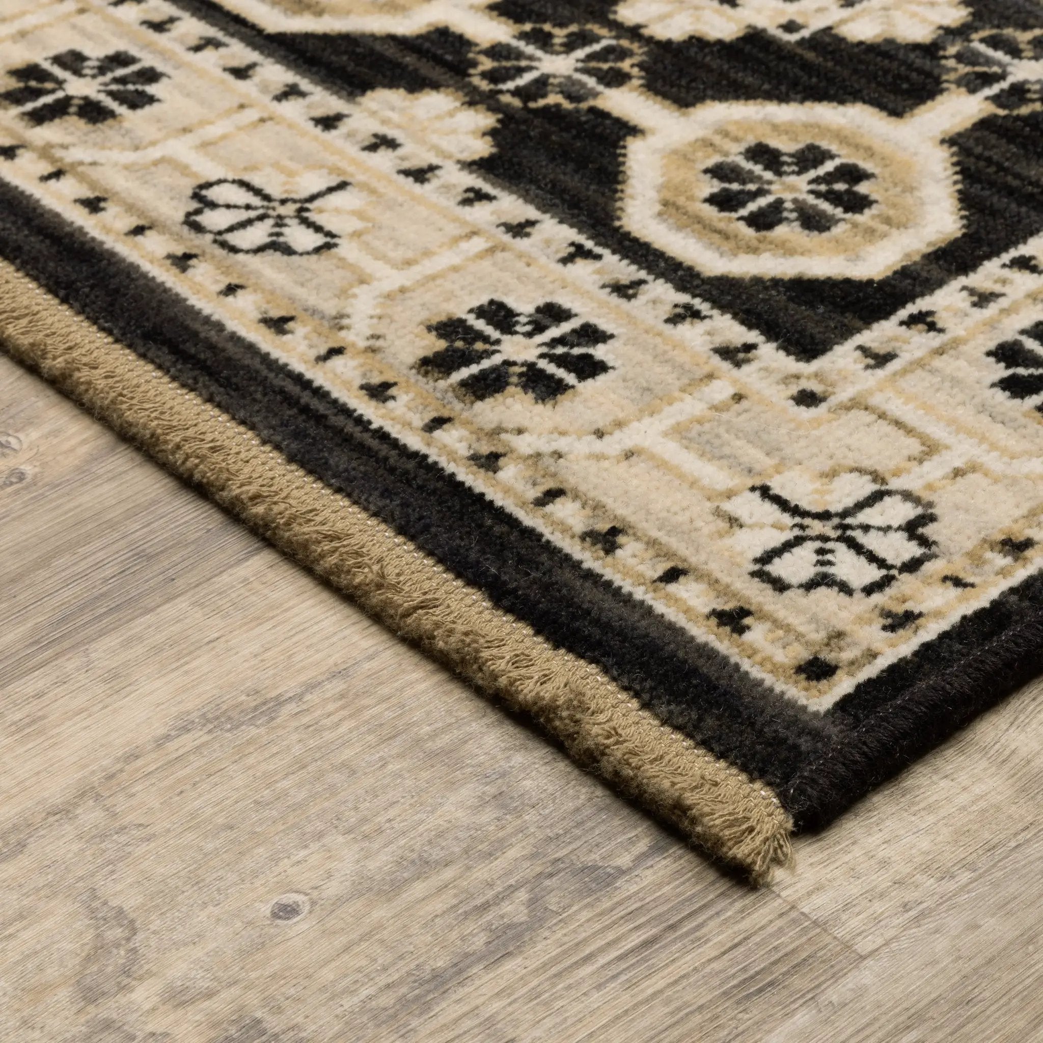 Acacia ACA09 Beige/Black statement area rug with classic pattern, beige and black contrast, earthy accent colors, and cotton fringe.