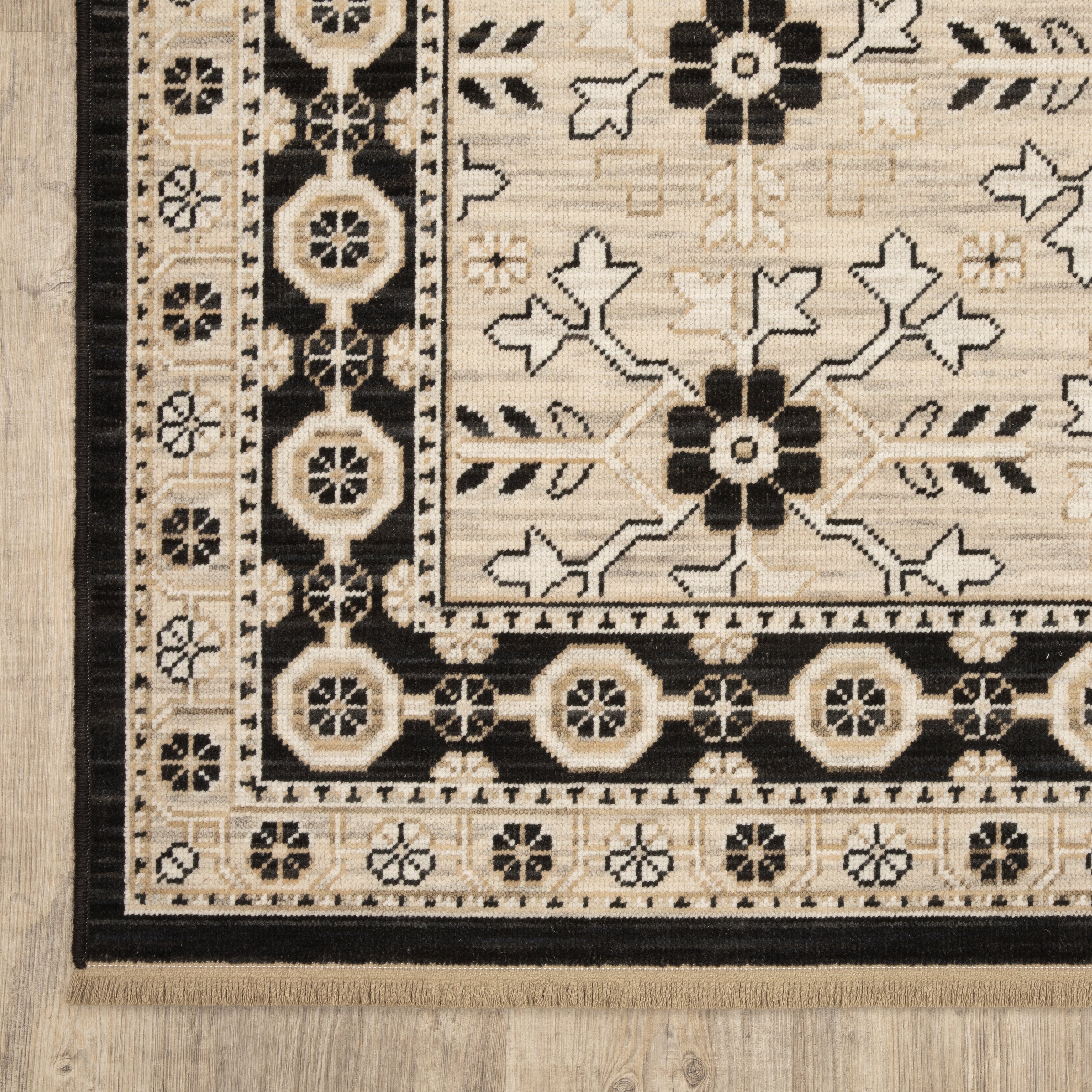Acacia ACA09 Beige/Black statement area rug with classic pattern, beige and black contrast, earthy accent colors, and cotton fringe.