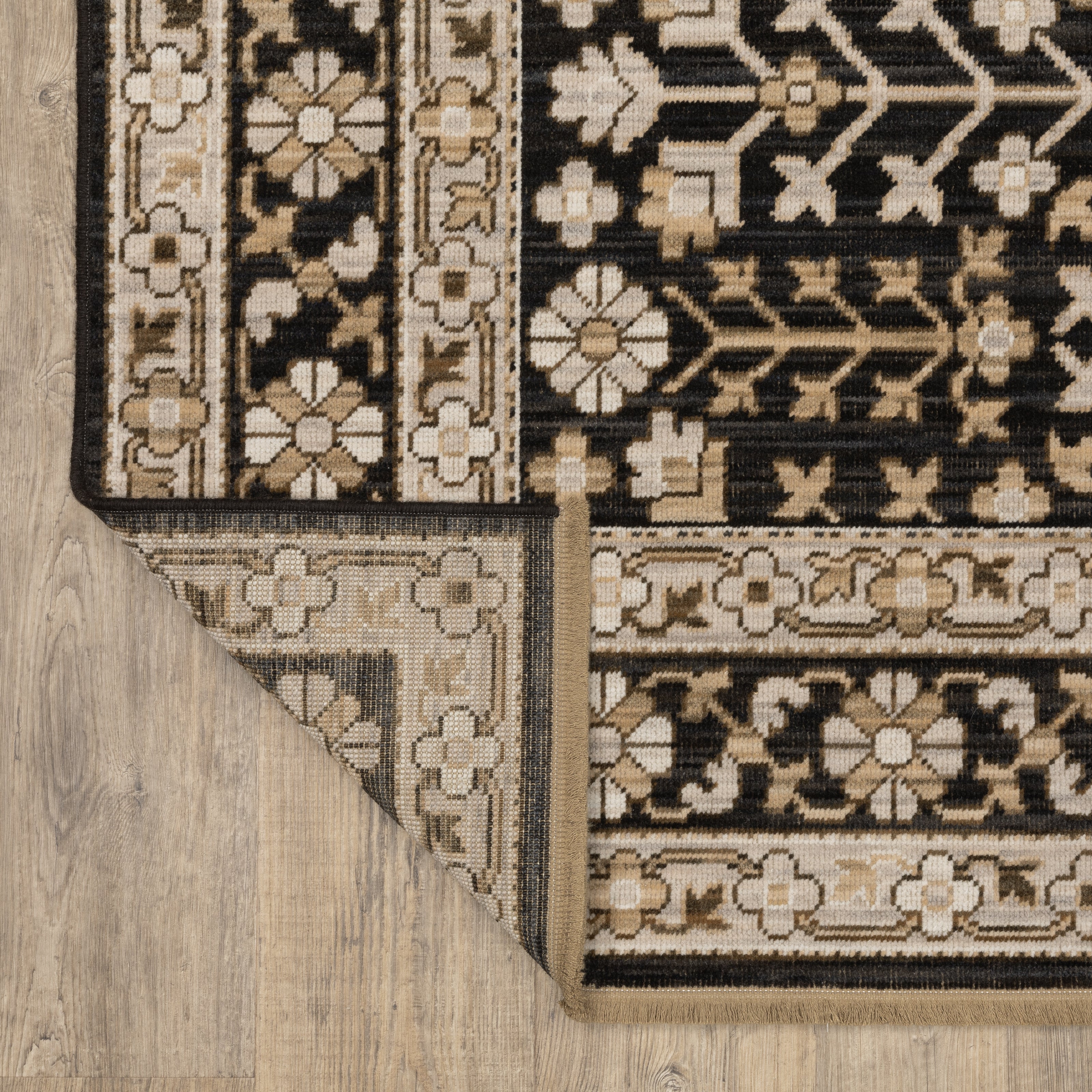 Acacia ACA10 Black/Beige traditional area rug with dramatic black and beige palette, multicolor accents, wool nylon texture, and fringe.