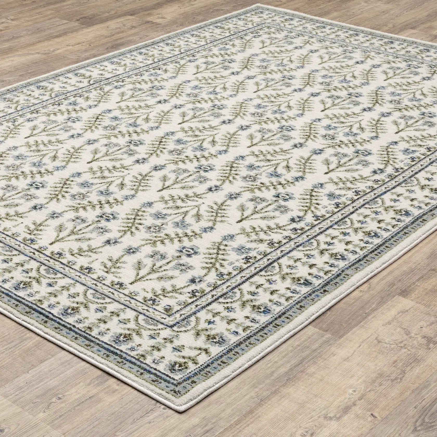 Andorra 3717C Ivory/ Blue Area Rug by Oriental Weavers