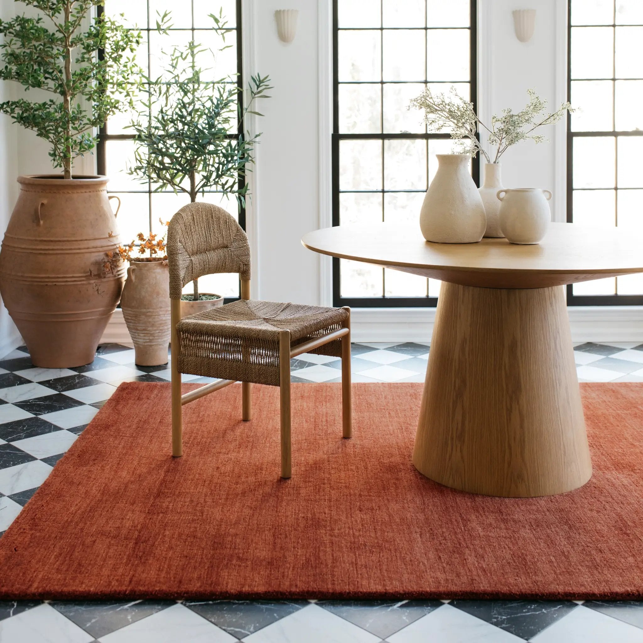 Aniston 27103 Rust Area Rug, rust solid wool area rug with heathered texture and warm handwoven surface.