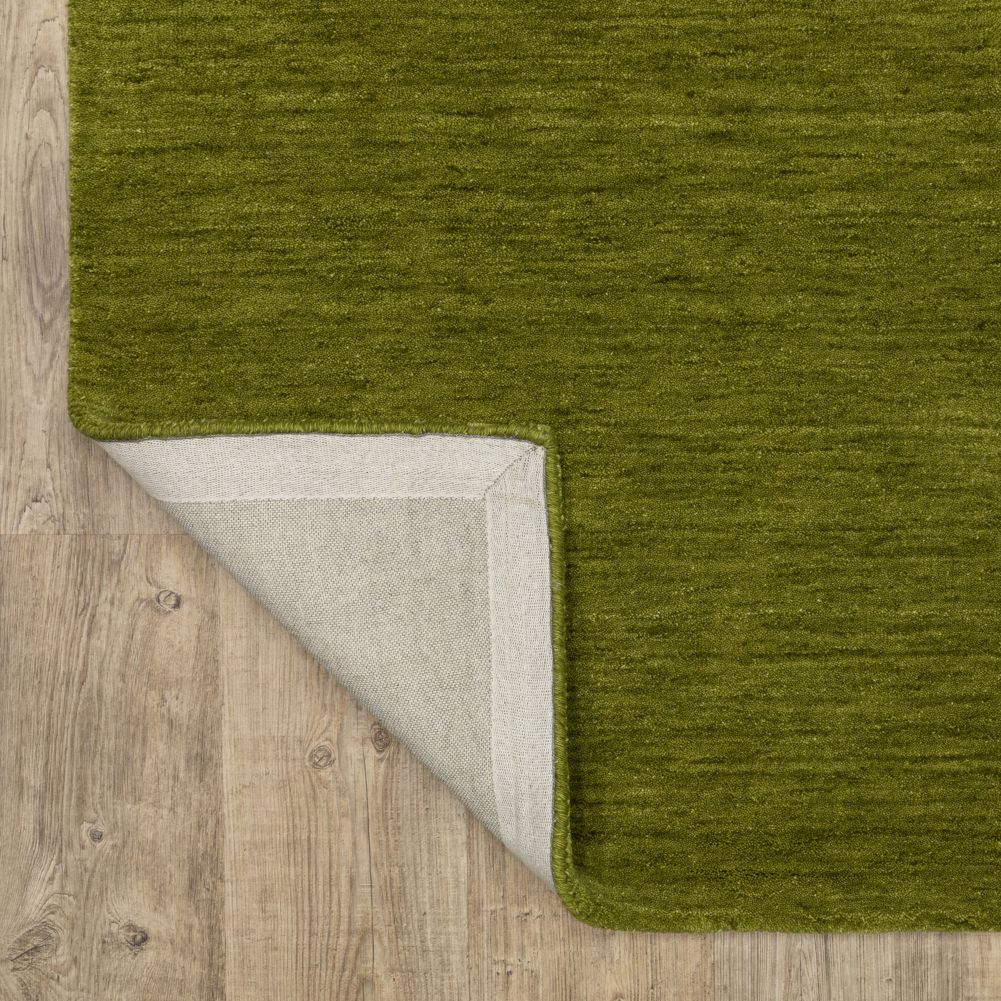 Aniston II 27116 Olive Green Area Rug, olive green solid wool area rug with heathered texture and plush hand-tufted surface.