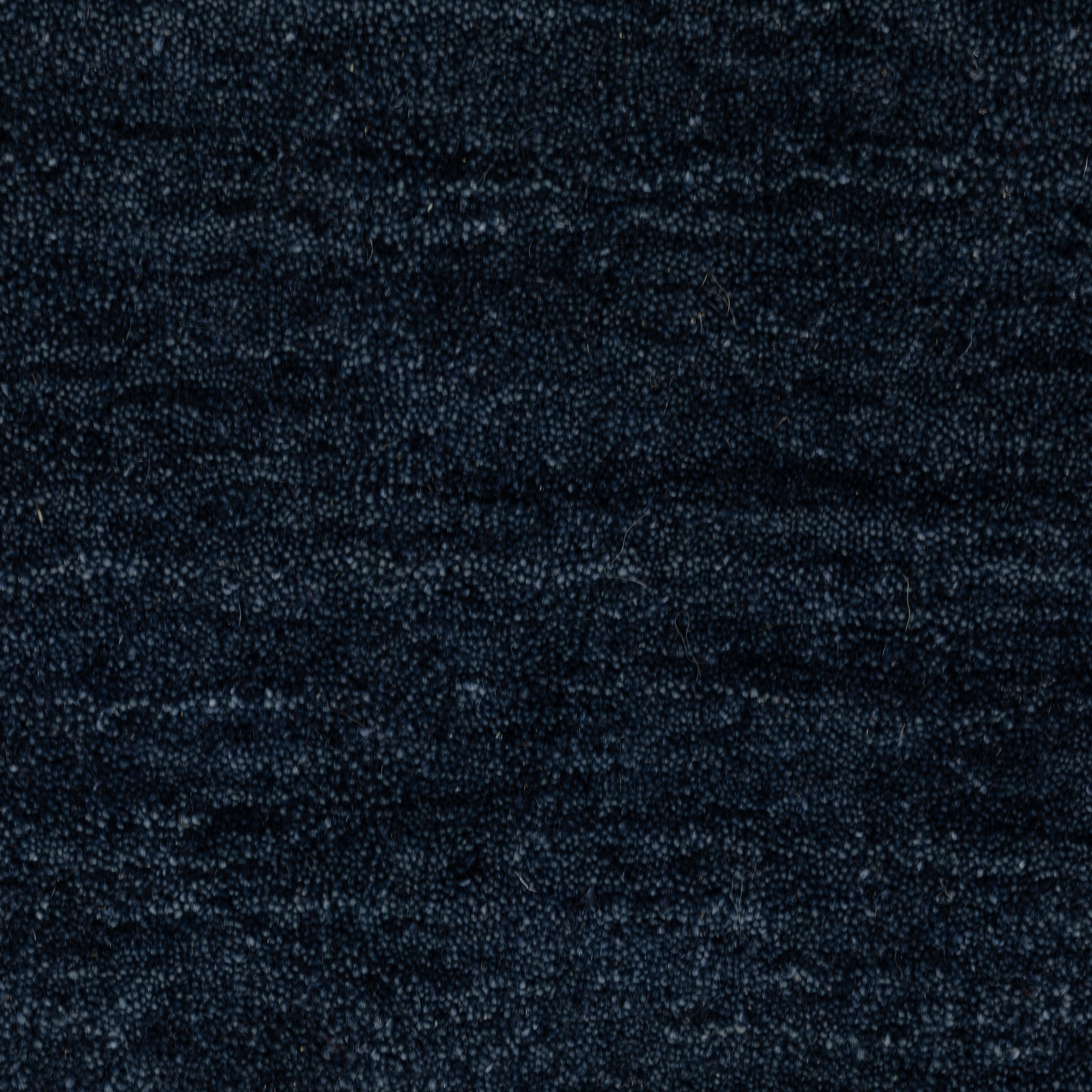 Aniston II 27119 Navy Area Rug, navy solid wool area rug with heathered texture and plush hand-tufted surface.