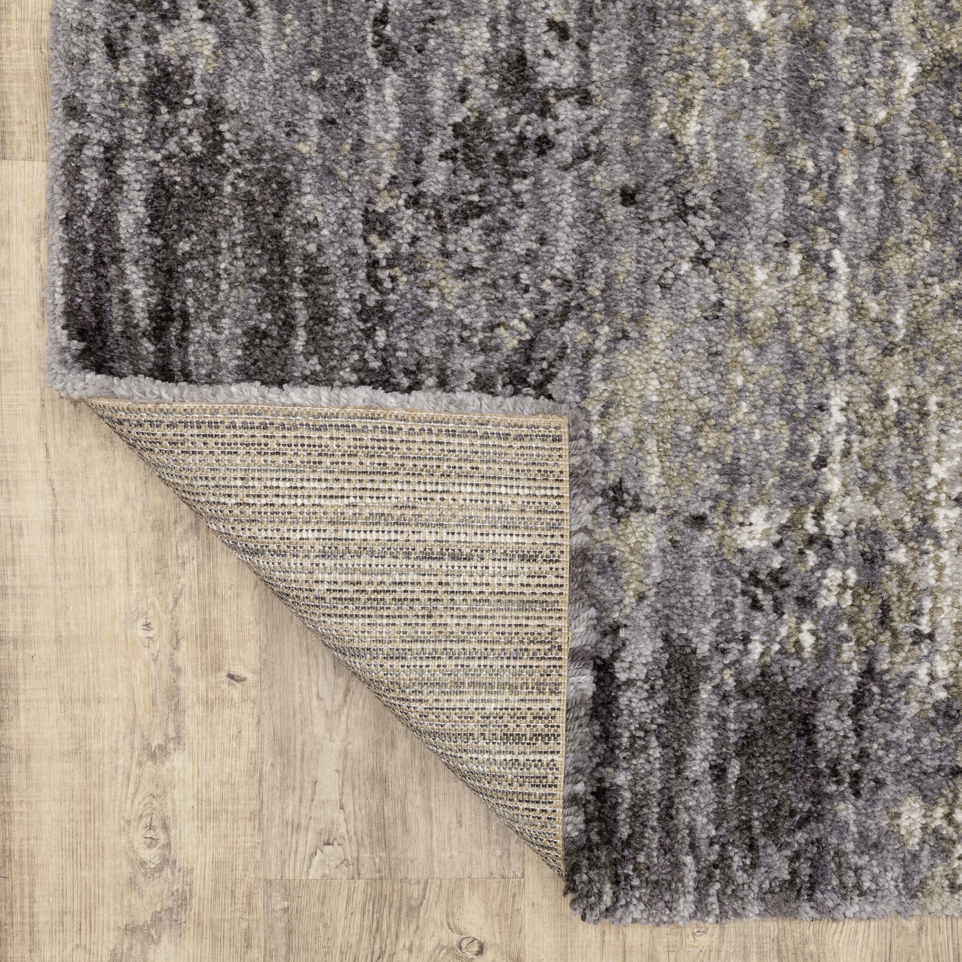 Oriental Weavers Aspen 2060W plush shag rug featuring abstract pattern in grey/ ivory tones